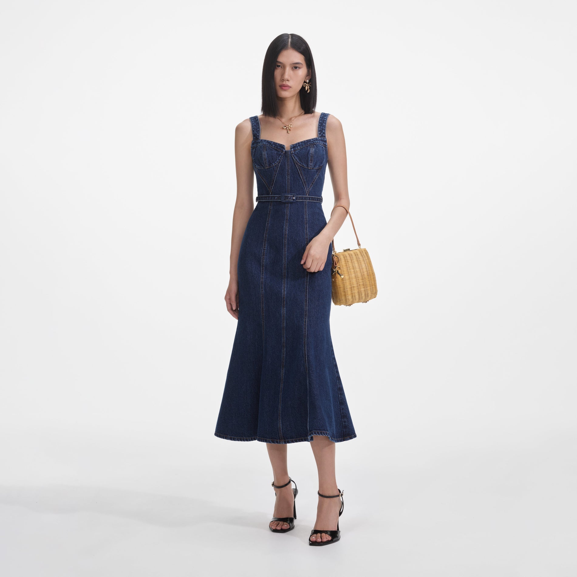 Front view of a woman wearing the Denim Sweetheart Midi Dress