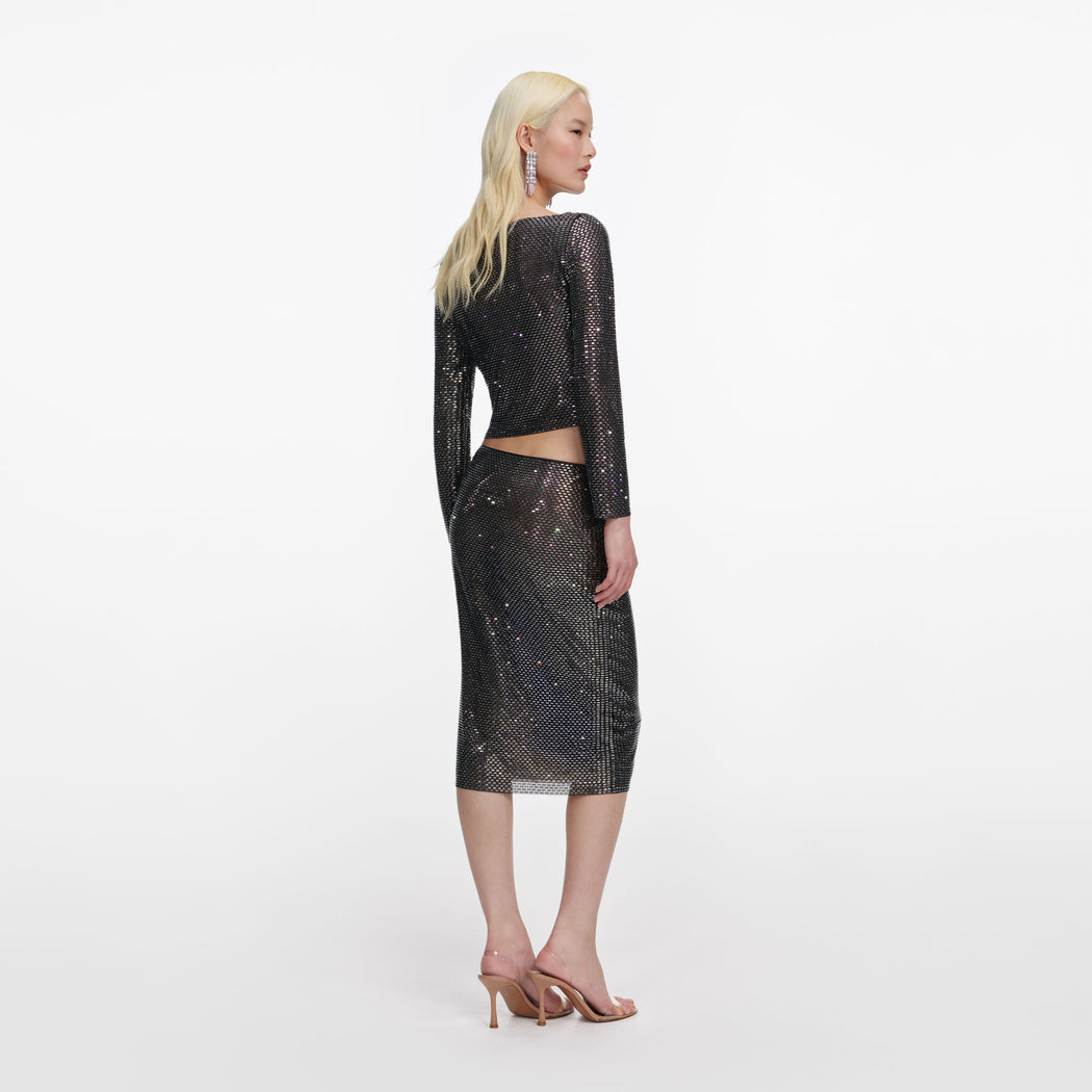 Back view of a woman wearing the Gunmetal Rhinestone Top