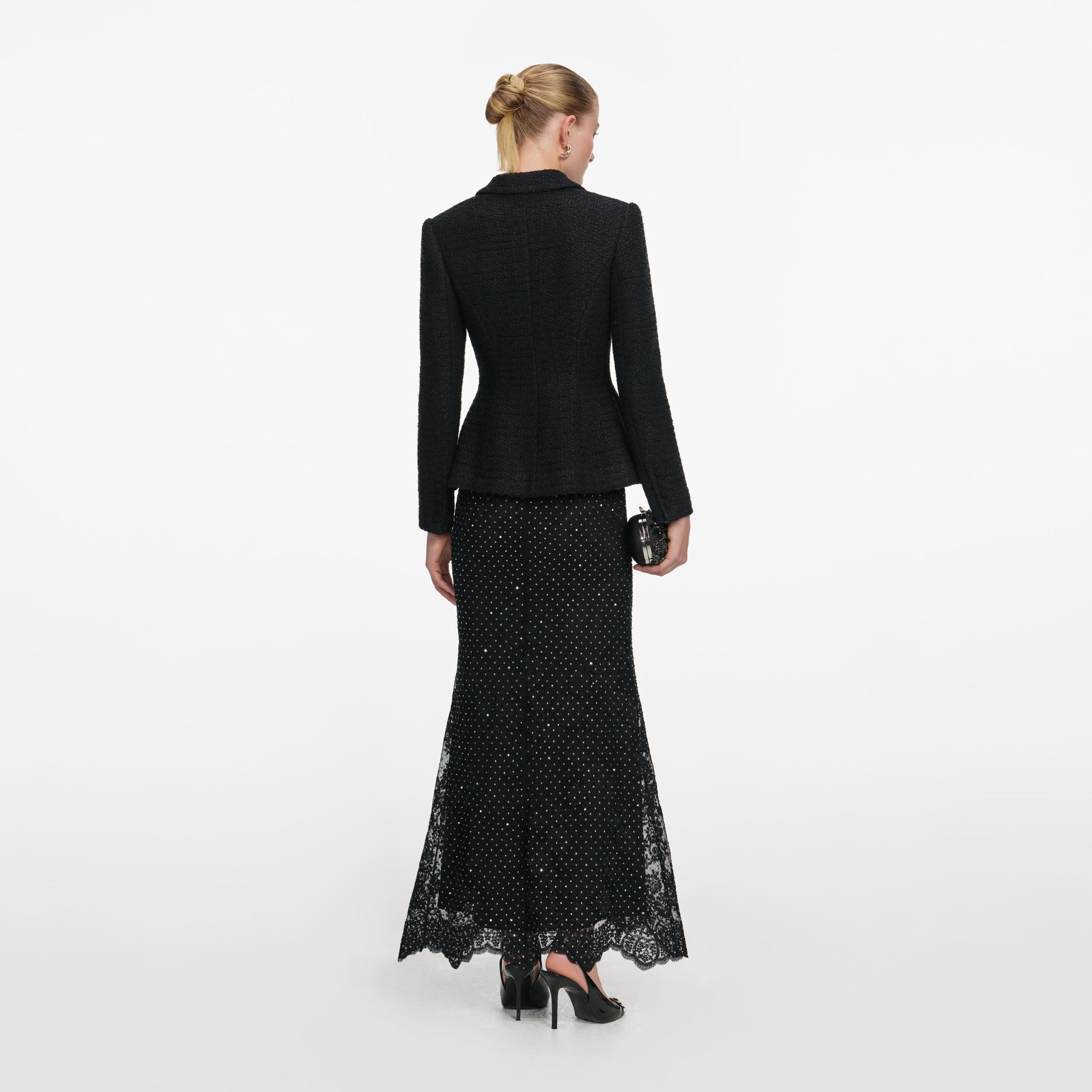 Back view of a woman wearing the Black Boucle Rhinestone Lace Maxi Dress