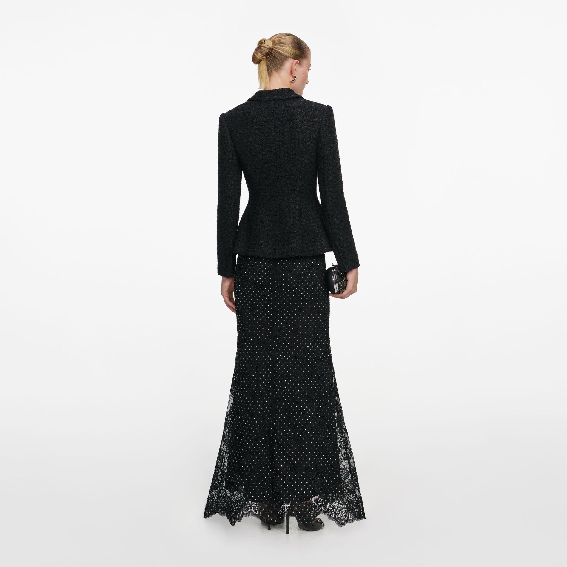 Back view of a woman wearing the Black Boucle Rhinestone Lace Maxi Dress