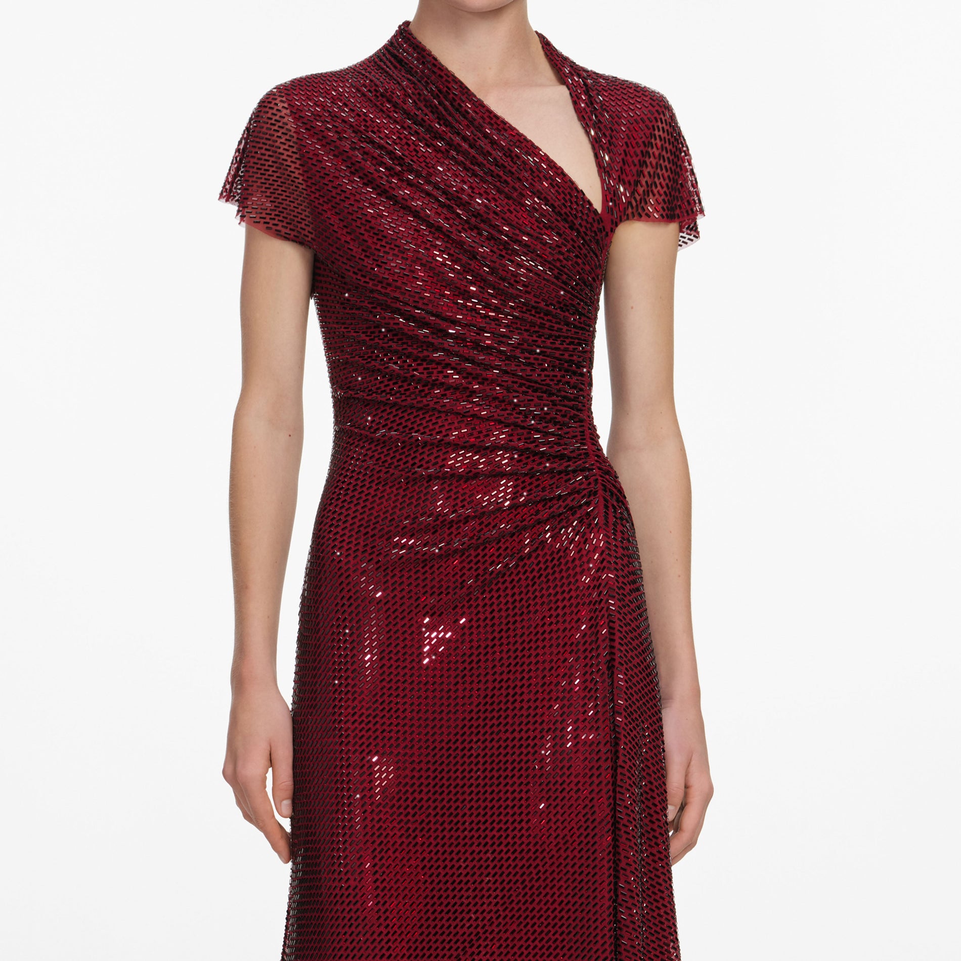 A close up of a woman wearing the Red Rhinestone Drape Midi Dress