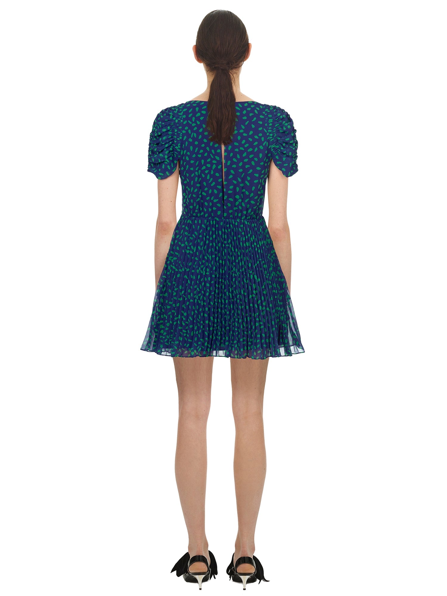 Back view of a woman wearing the Blue and Green Dot Chiffon Printed Dress