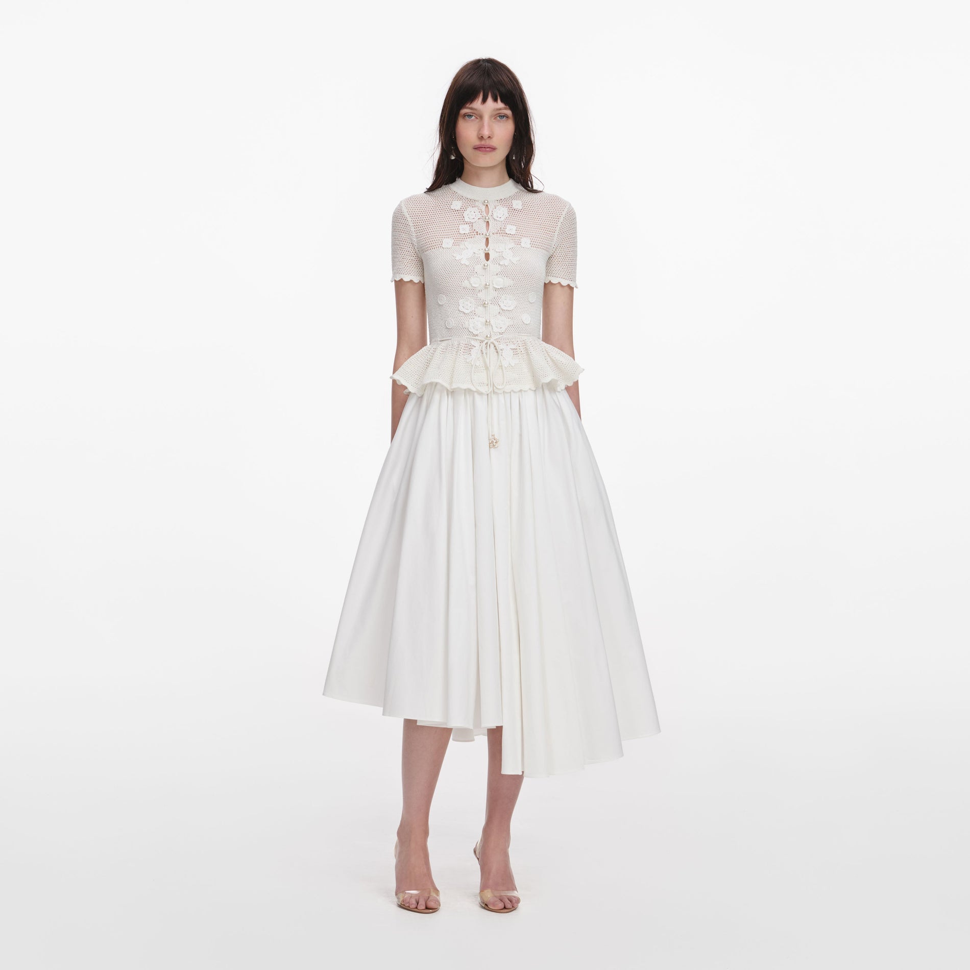 Front view of a woman wearing the White Floral Crochet Top