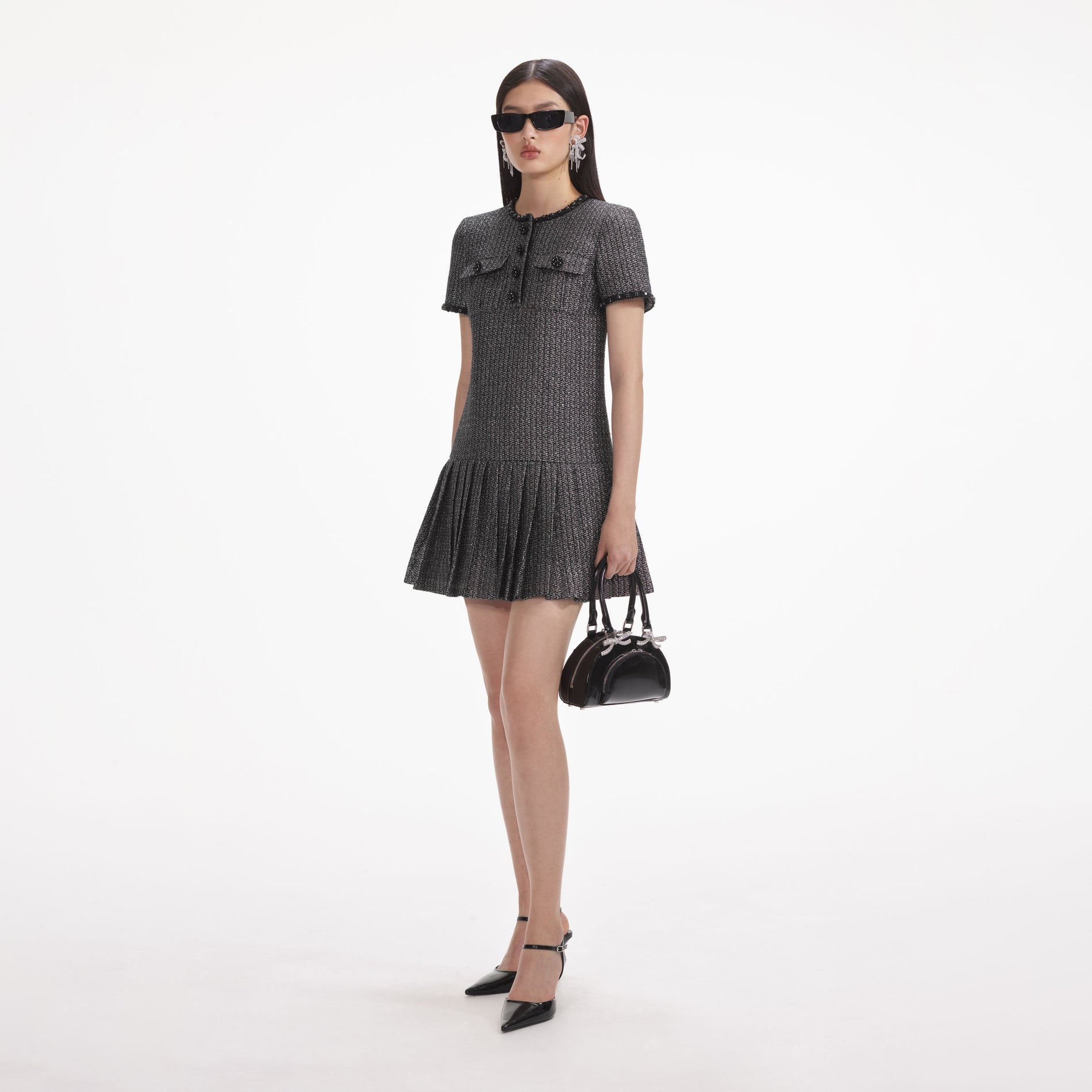 Side view of a woman wearing the Metallic Boucle Mini Dress