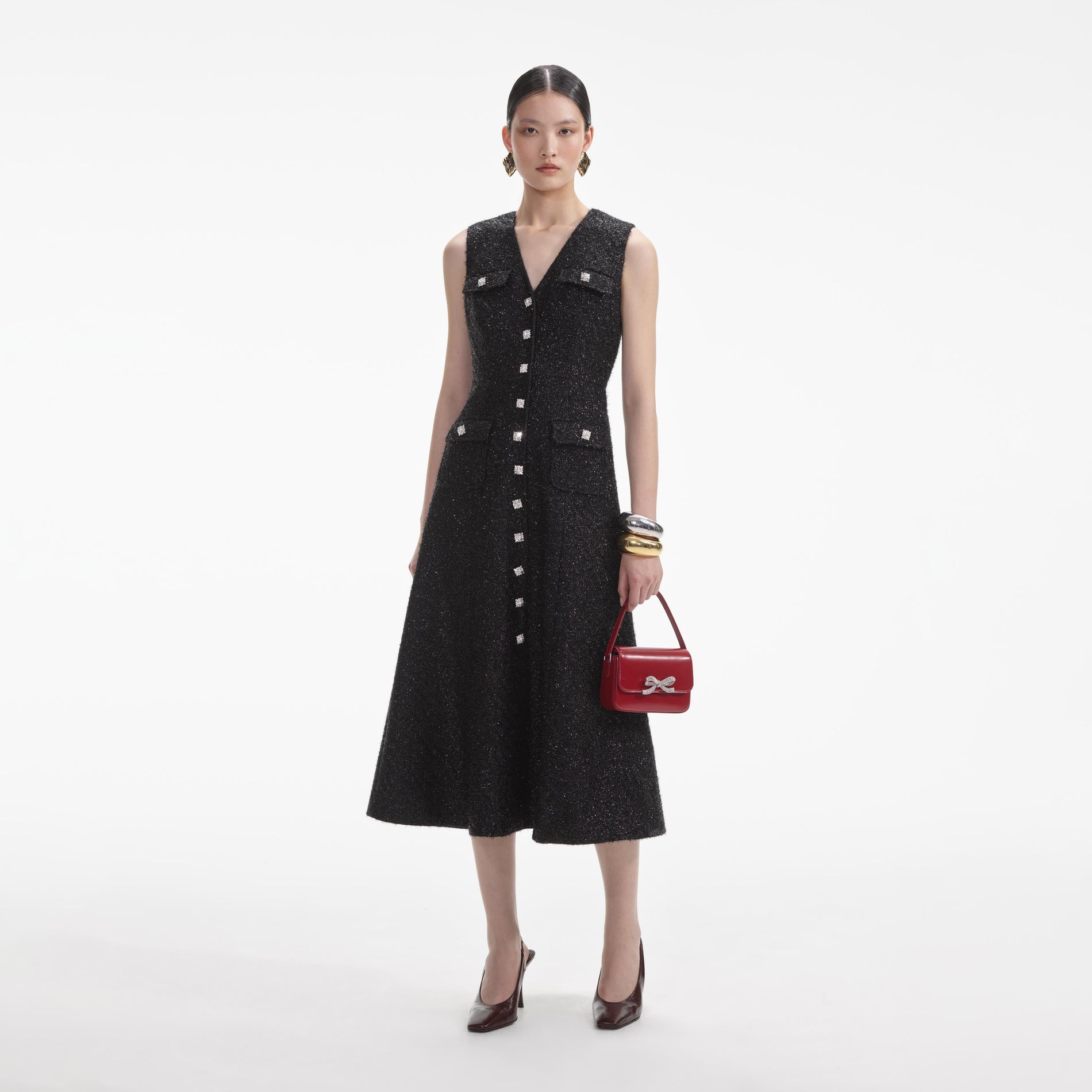 Front view of a woman wearing the Black Tinsel Boucle Buttoned Midi Dress