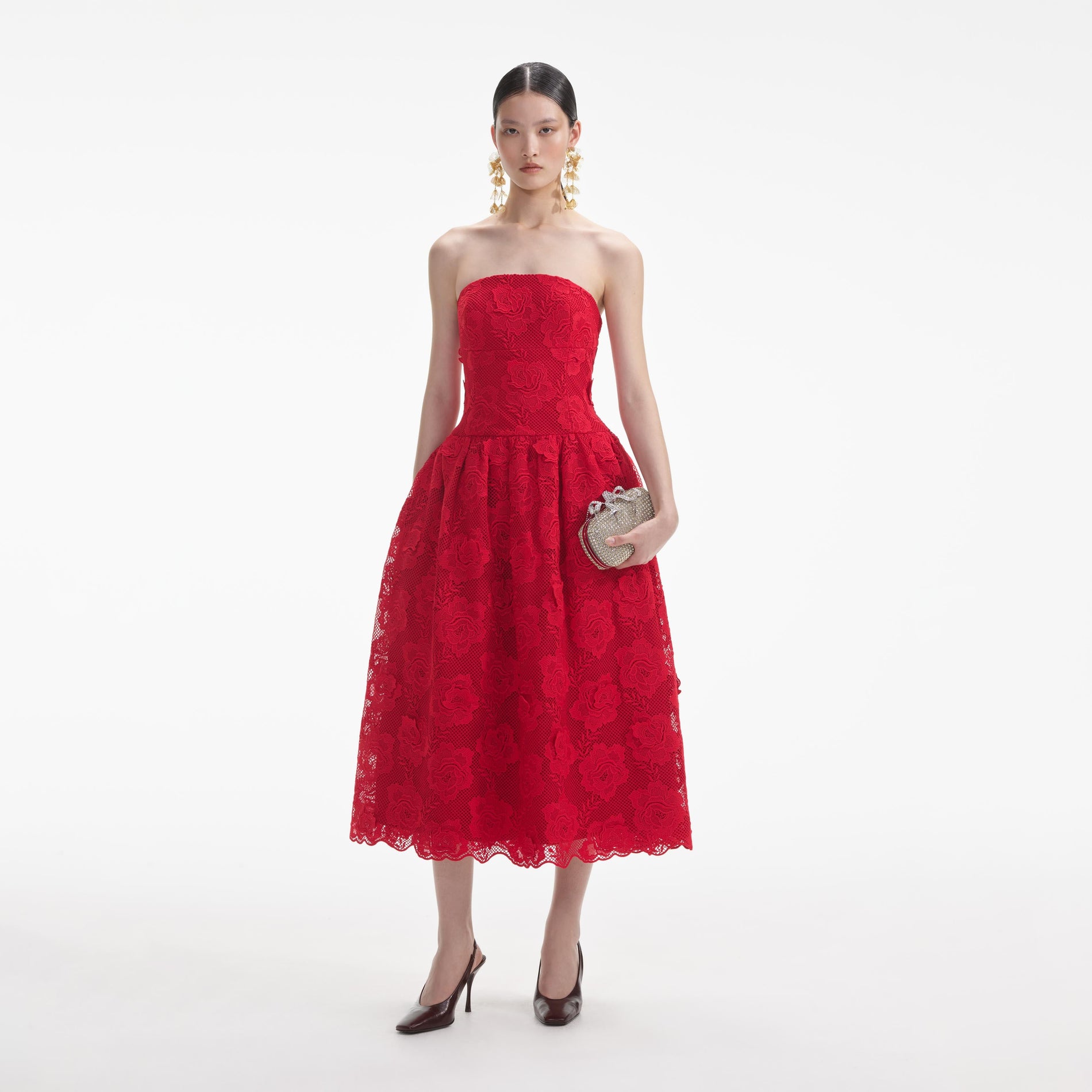 Front view of a woman wearing the Red Bandeau Lace Midi Dress