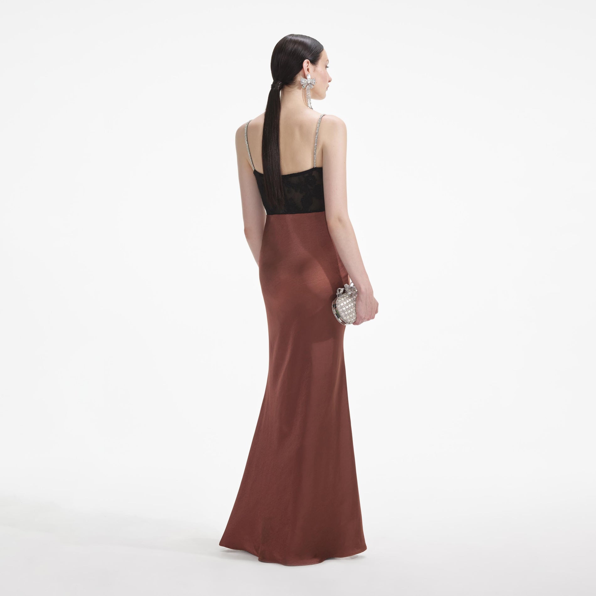 Back view of a woman wearing the White Brown Satin Diamante Maxi Dress