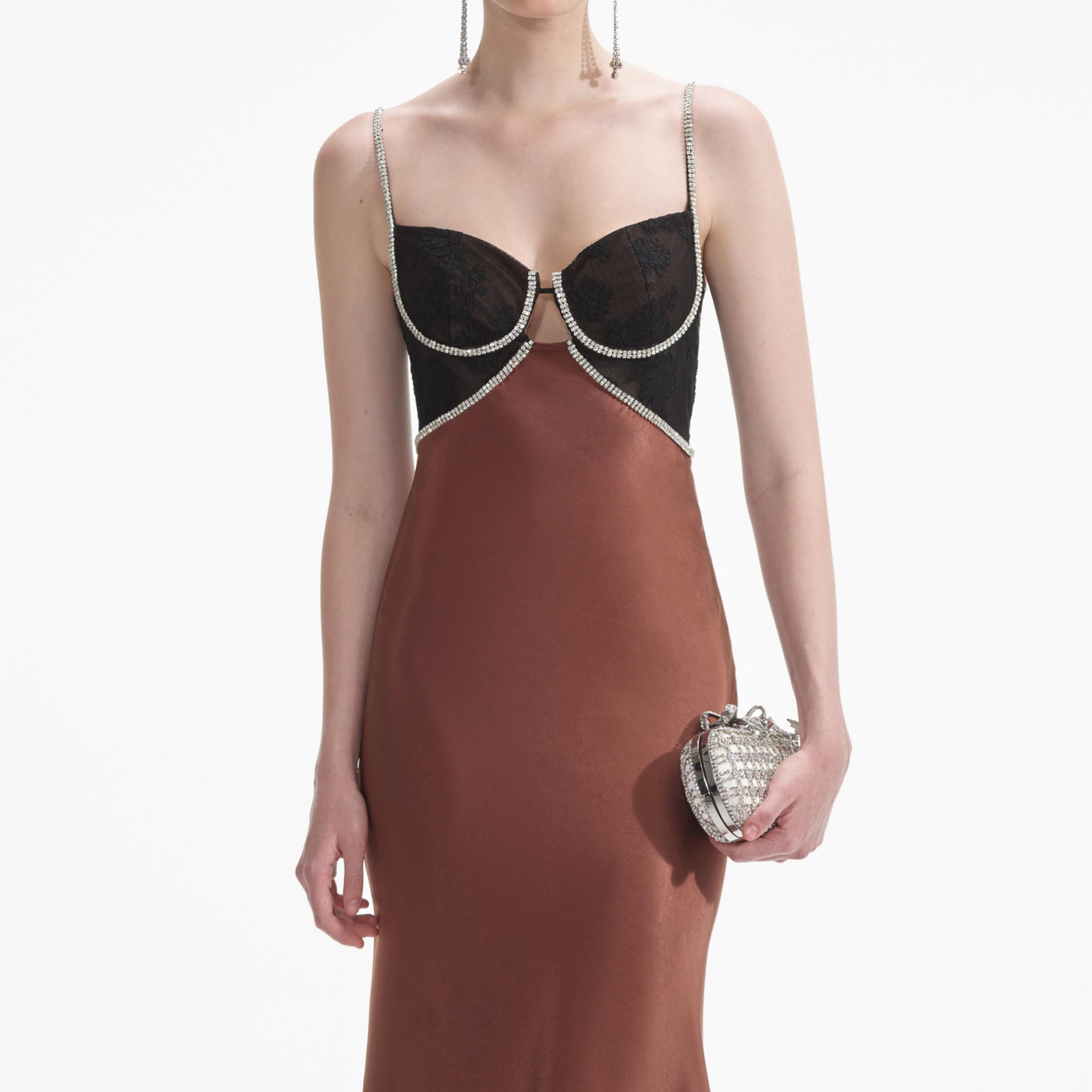 A close up of a woman wearing the Brown Satin Diamante Maxi Dress