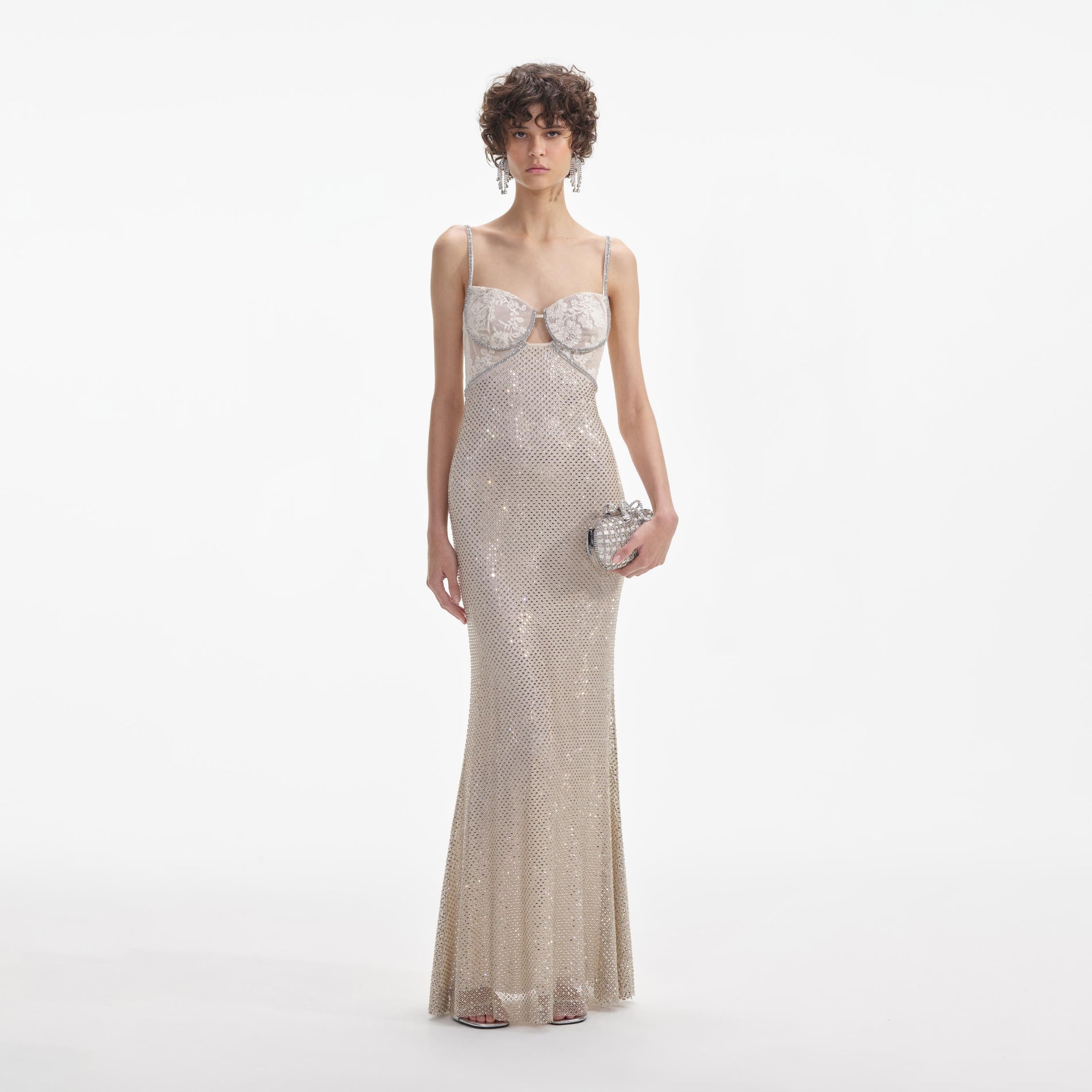 Front view of a woman wearing the Cream Rhinestone Mesh Maxi Dress