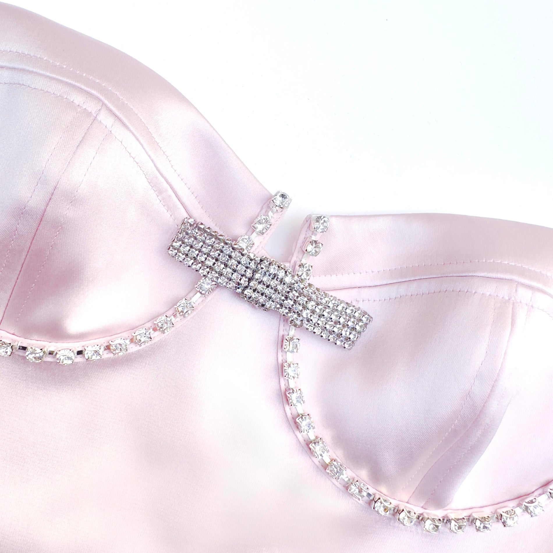 A close up of the fabric for the Pink Satin Diamante Mini Dress