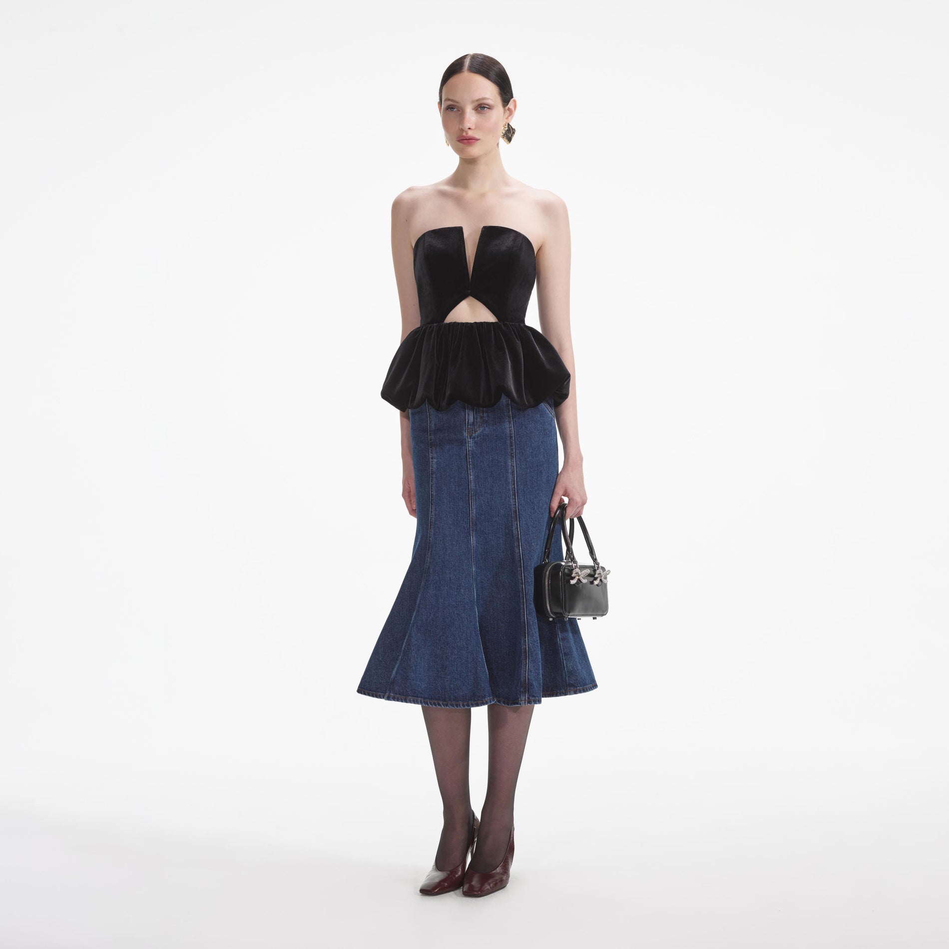 Side view of a woman wearing the Black Velvet Bandeau Top