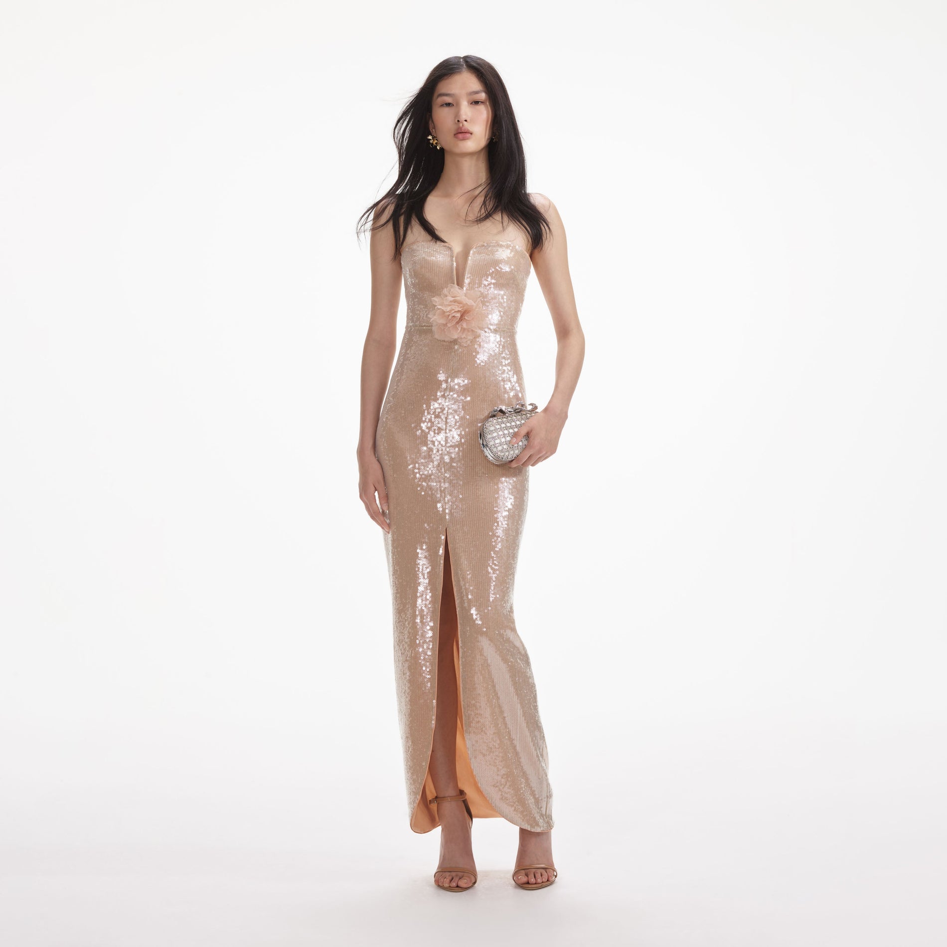 Front view of a woman wearing the Champagne Sequin Maxi Dress