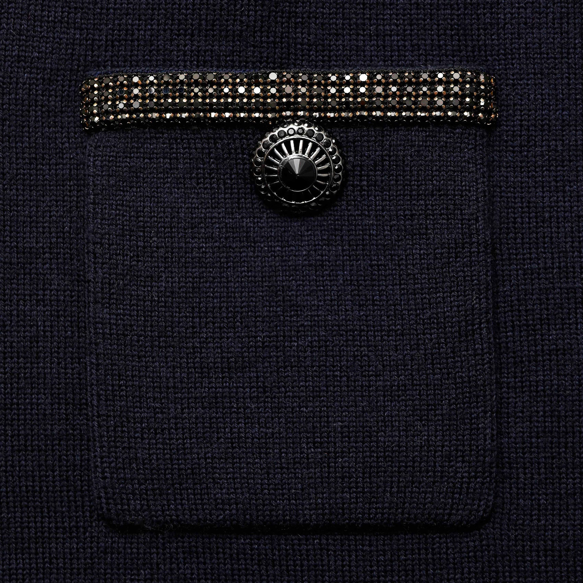 A close up of the fabric for the Navy Embellished Knit Midi Skirt