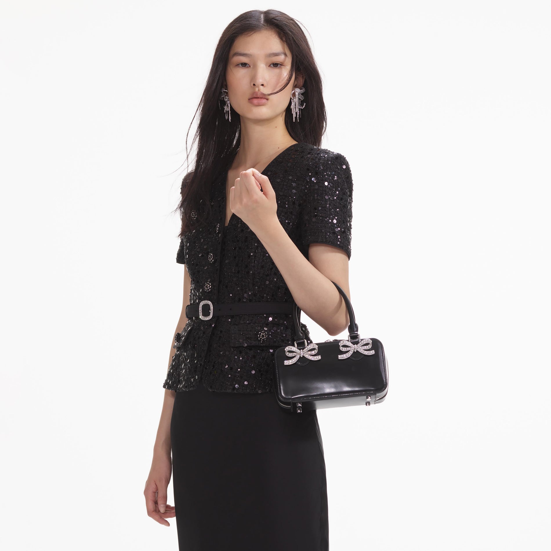 A close up of the fabric for the Black Leather Mini Tote Bag