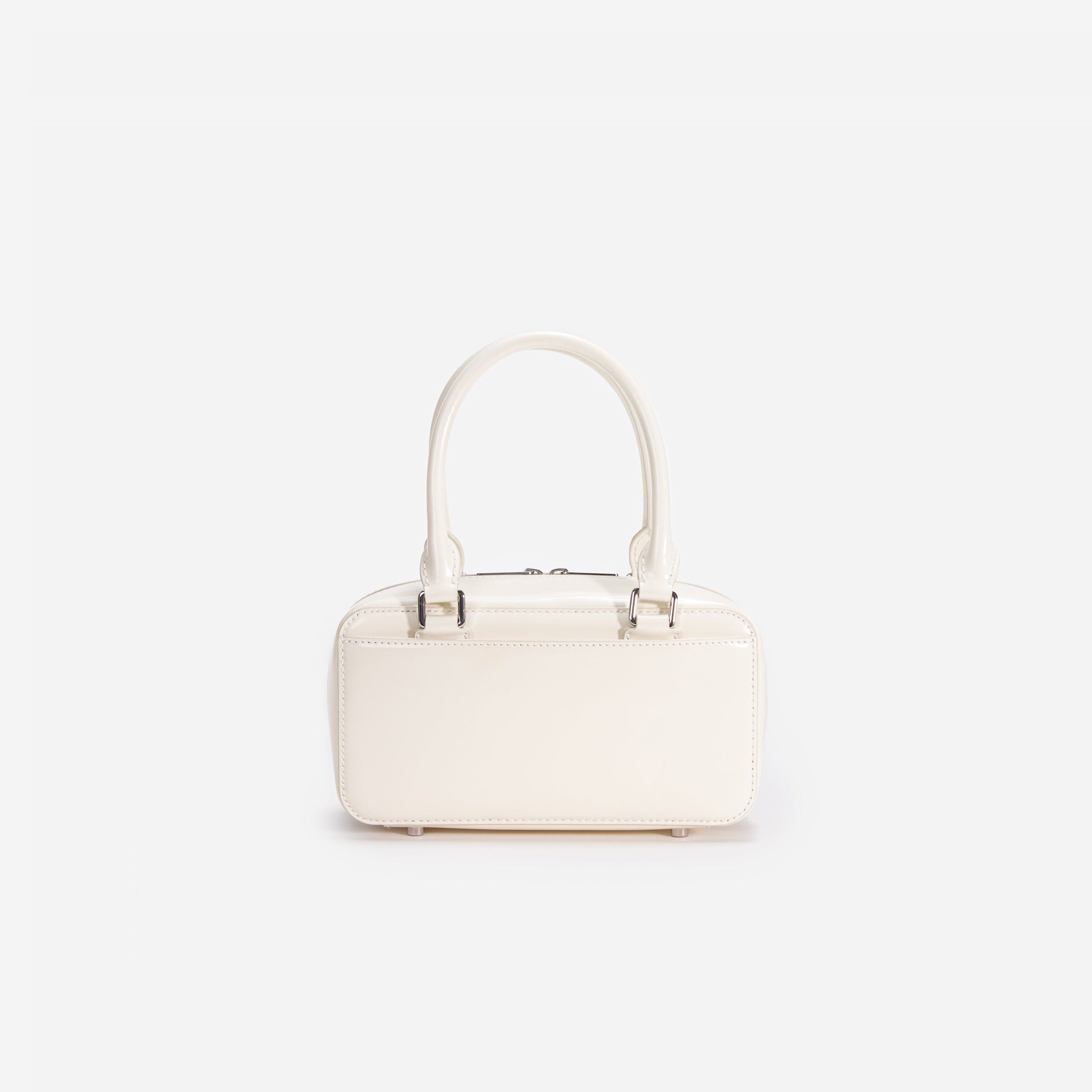 Back view of a woman wearing the White Cream Leather Mini Tote Bag