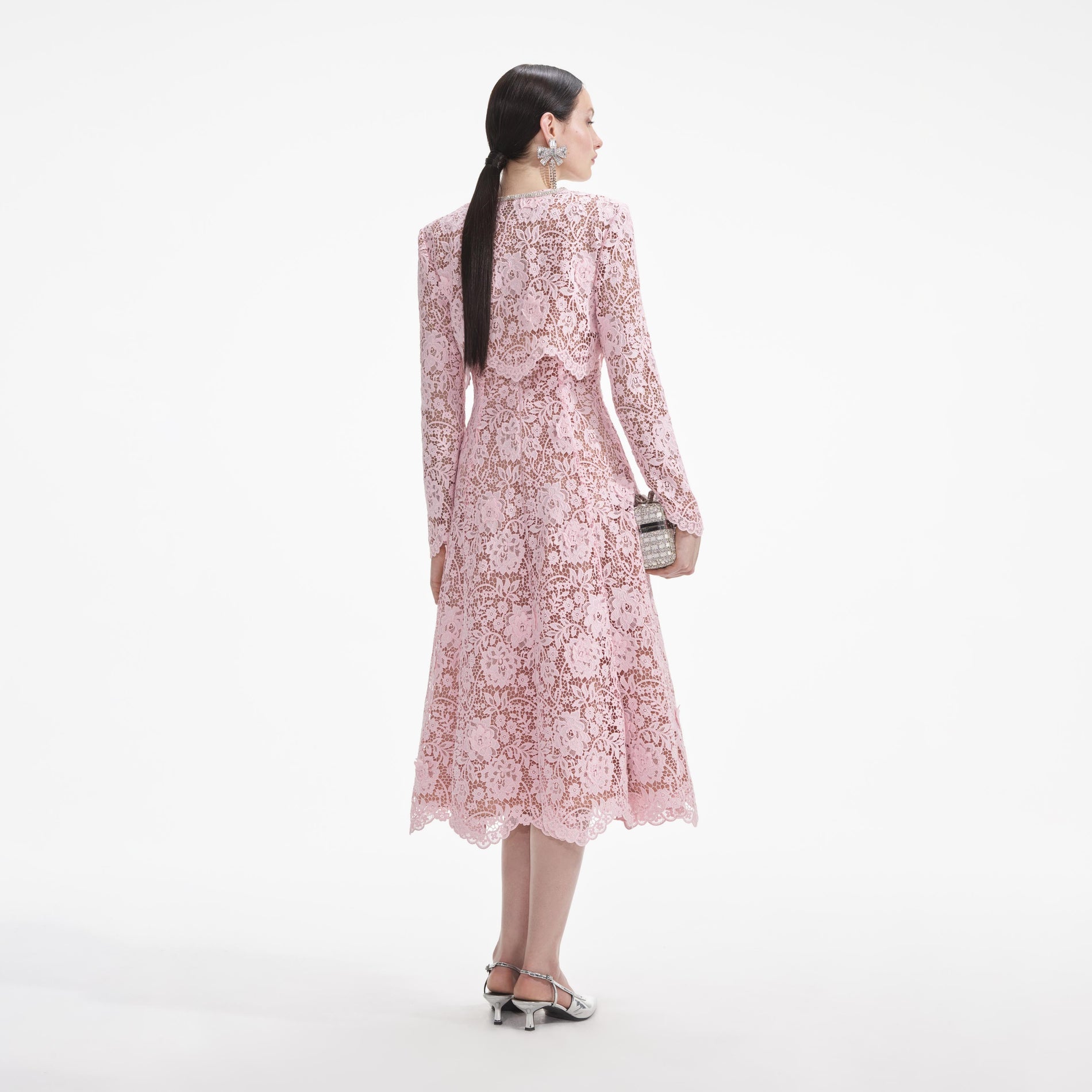 Back view of a woman wearing the Pink Flower Lace Jacket