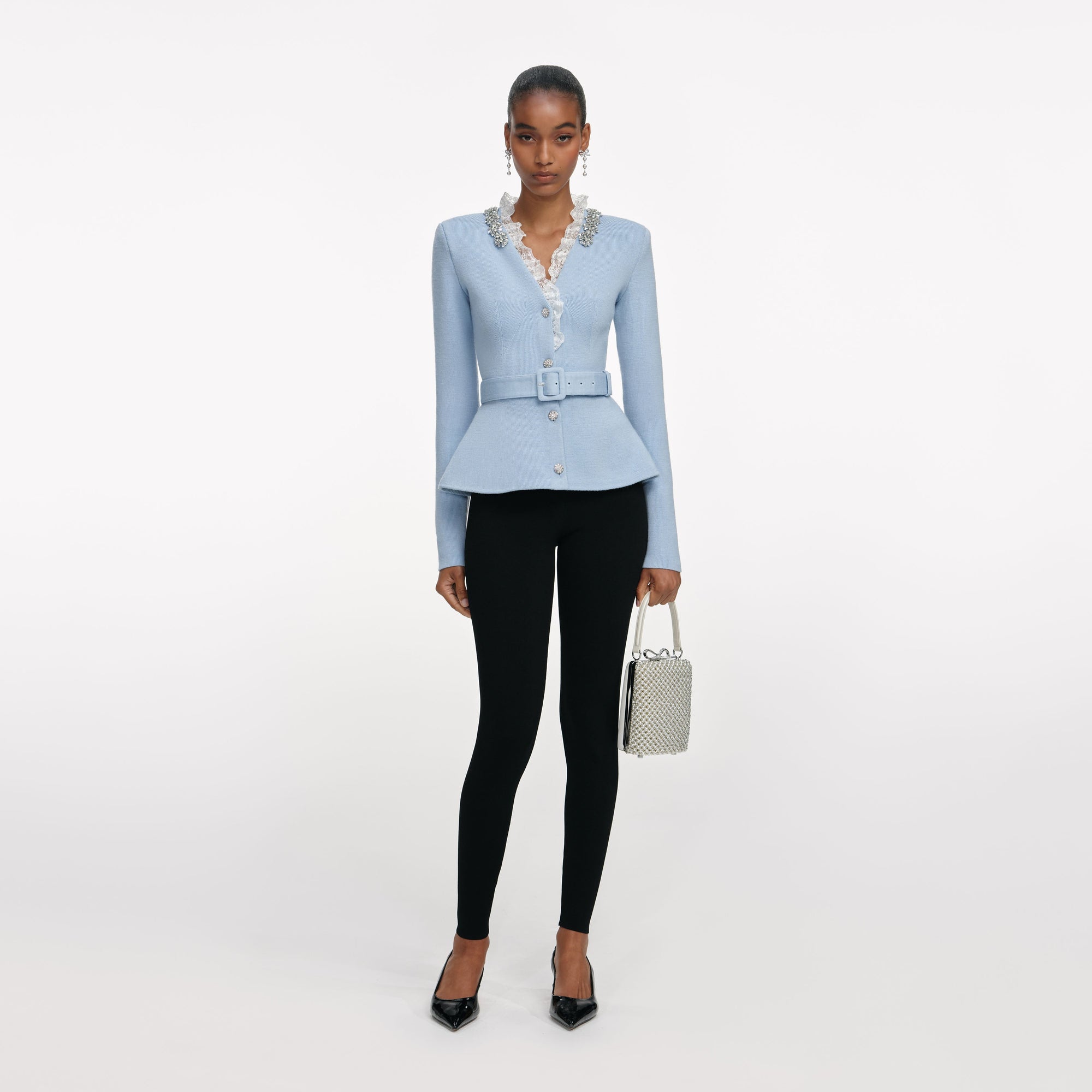 Front view of a woman wearing the Blue Crystal Trim Cardigan