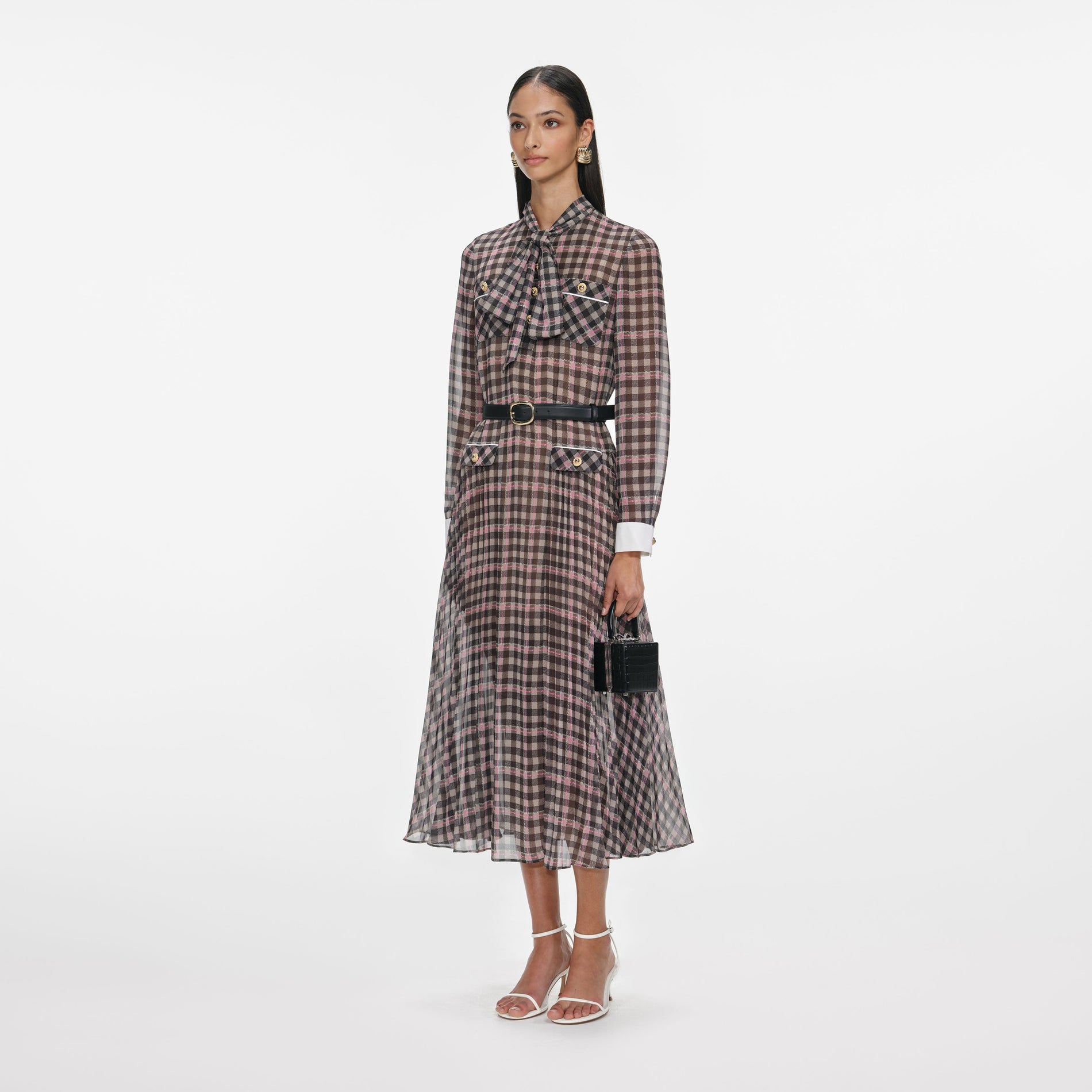 Side view of a woman wearing the Brown Check Chiffon Midi Dress