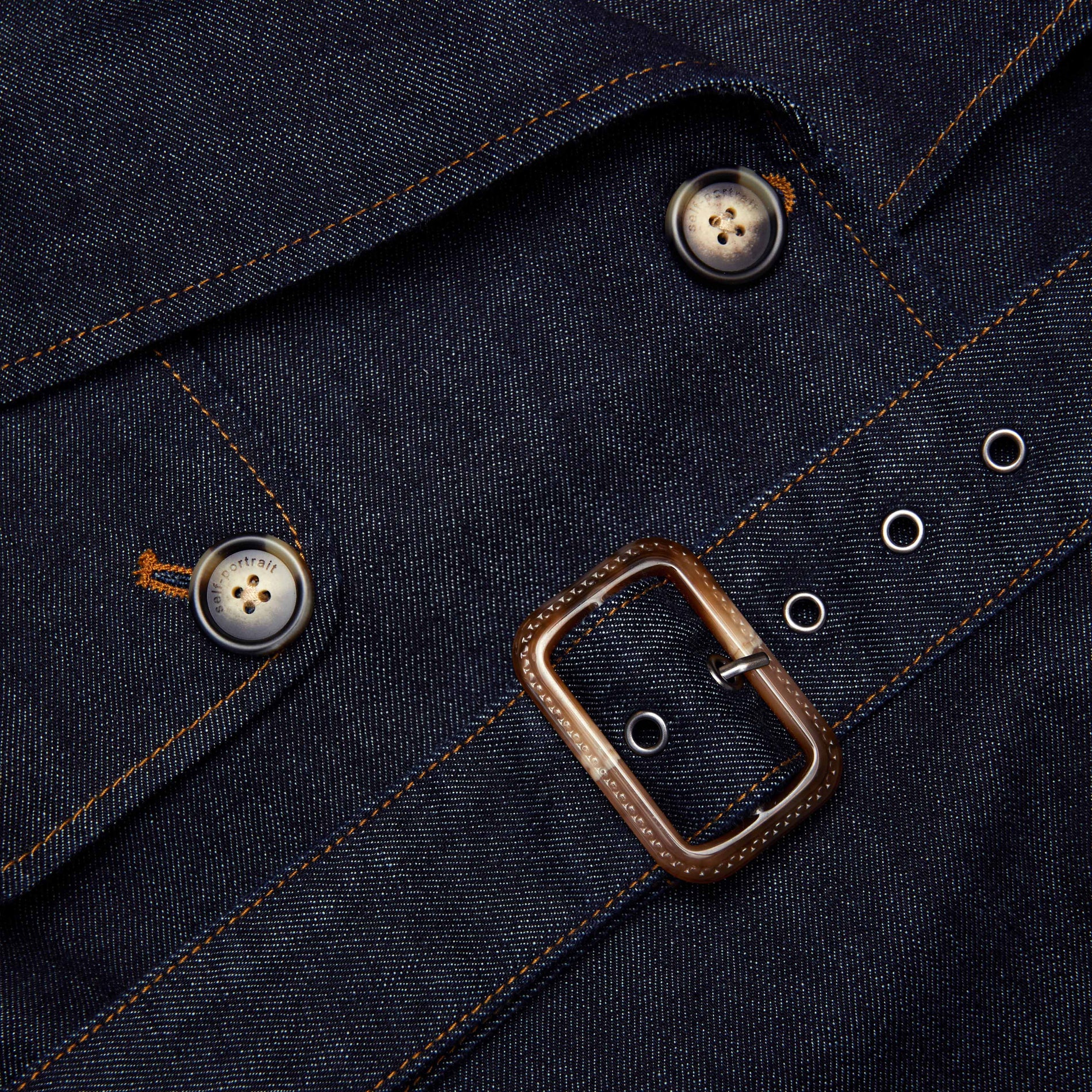 A close up of the fabric for the Indigo Denim Trench Coat