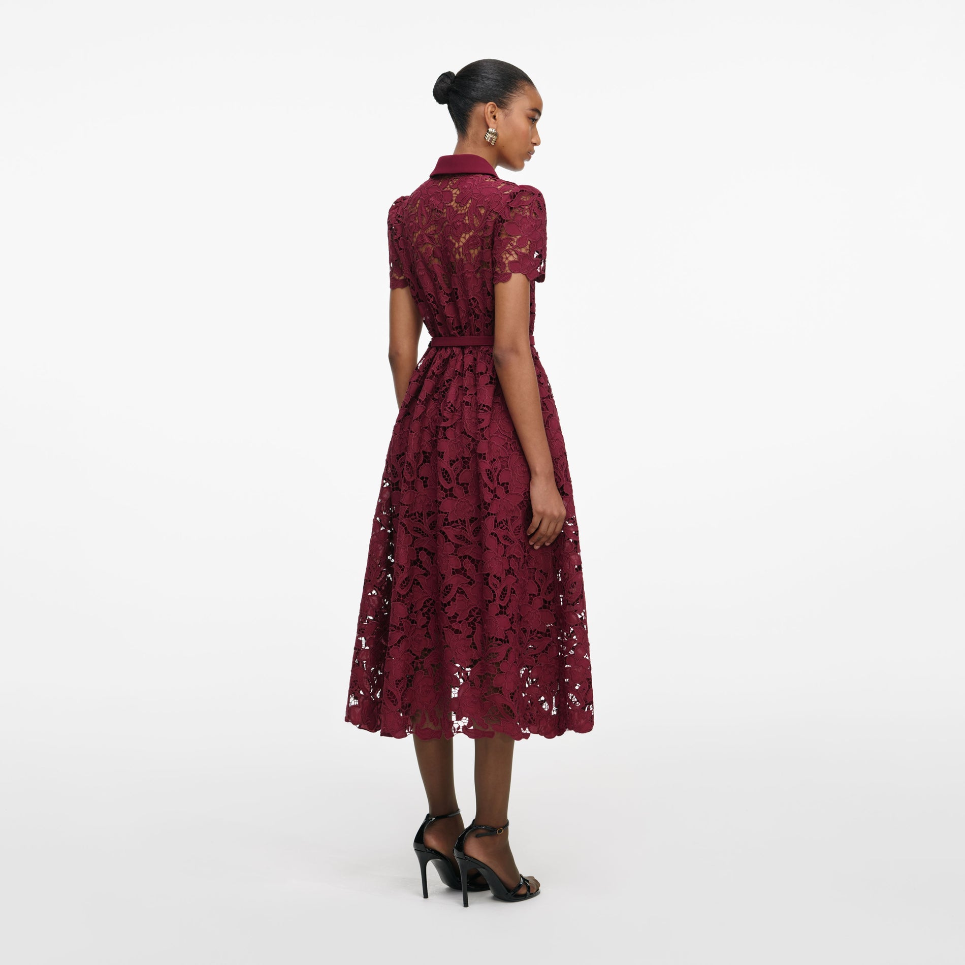 Back view of a woman wearing the Burgundy Lace Collared Midi Dress