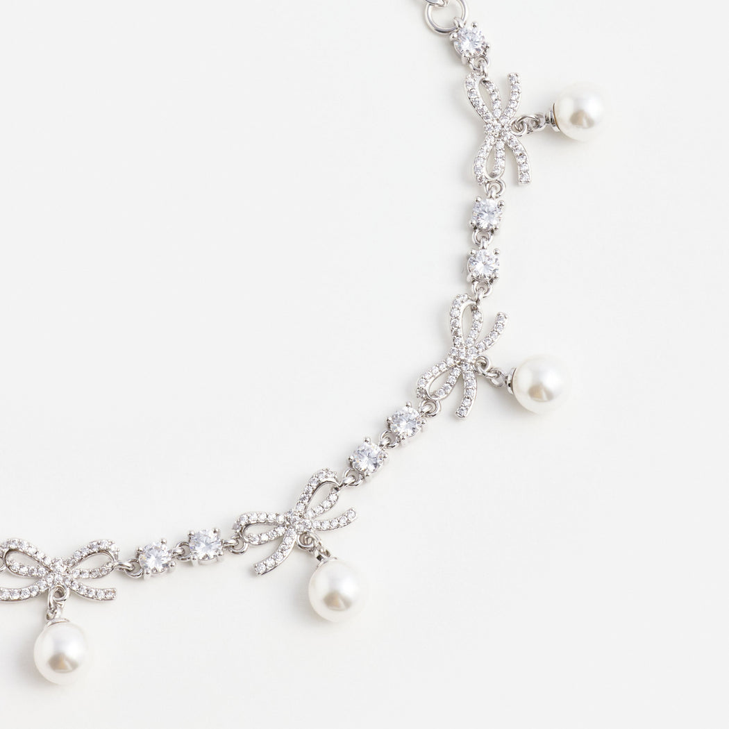 Crystal Bow Pearl Charm Bracelet