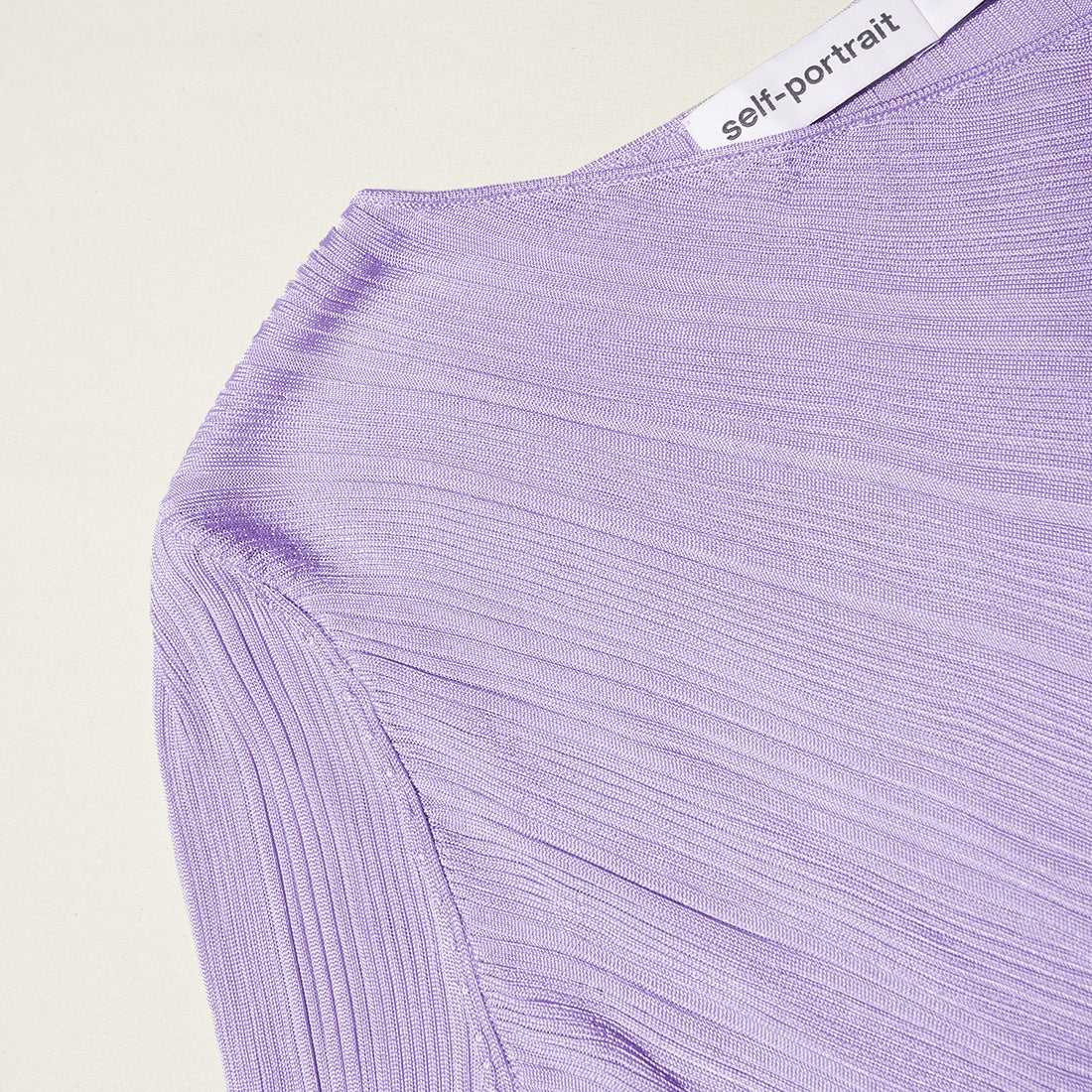 A close up of the fabric for the Lilac Knit Midi Dress