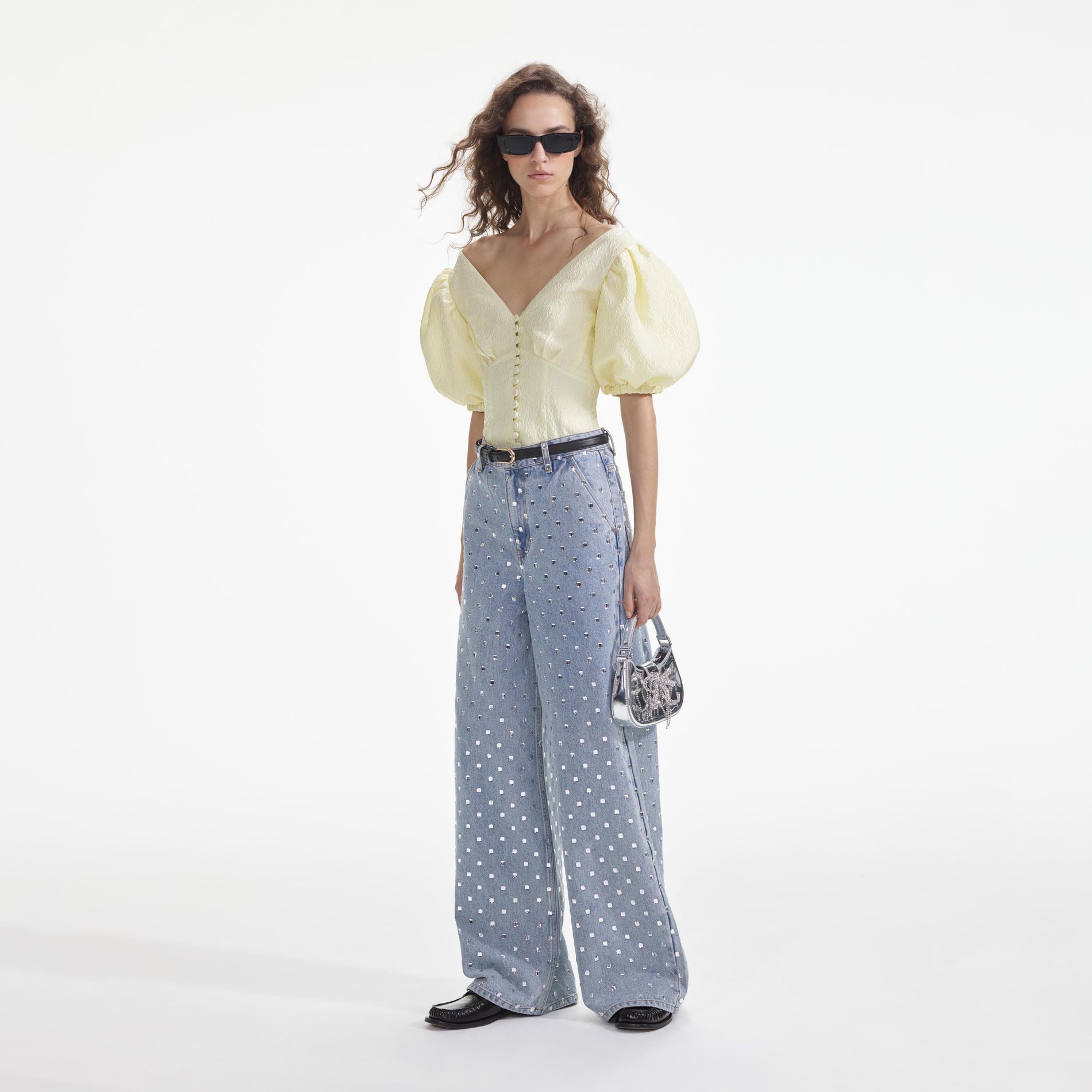 Side view of a woman wearing the Yellow Jacquard Top