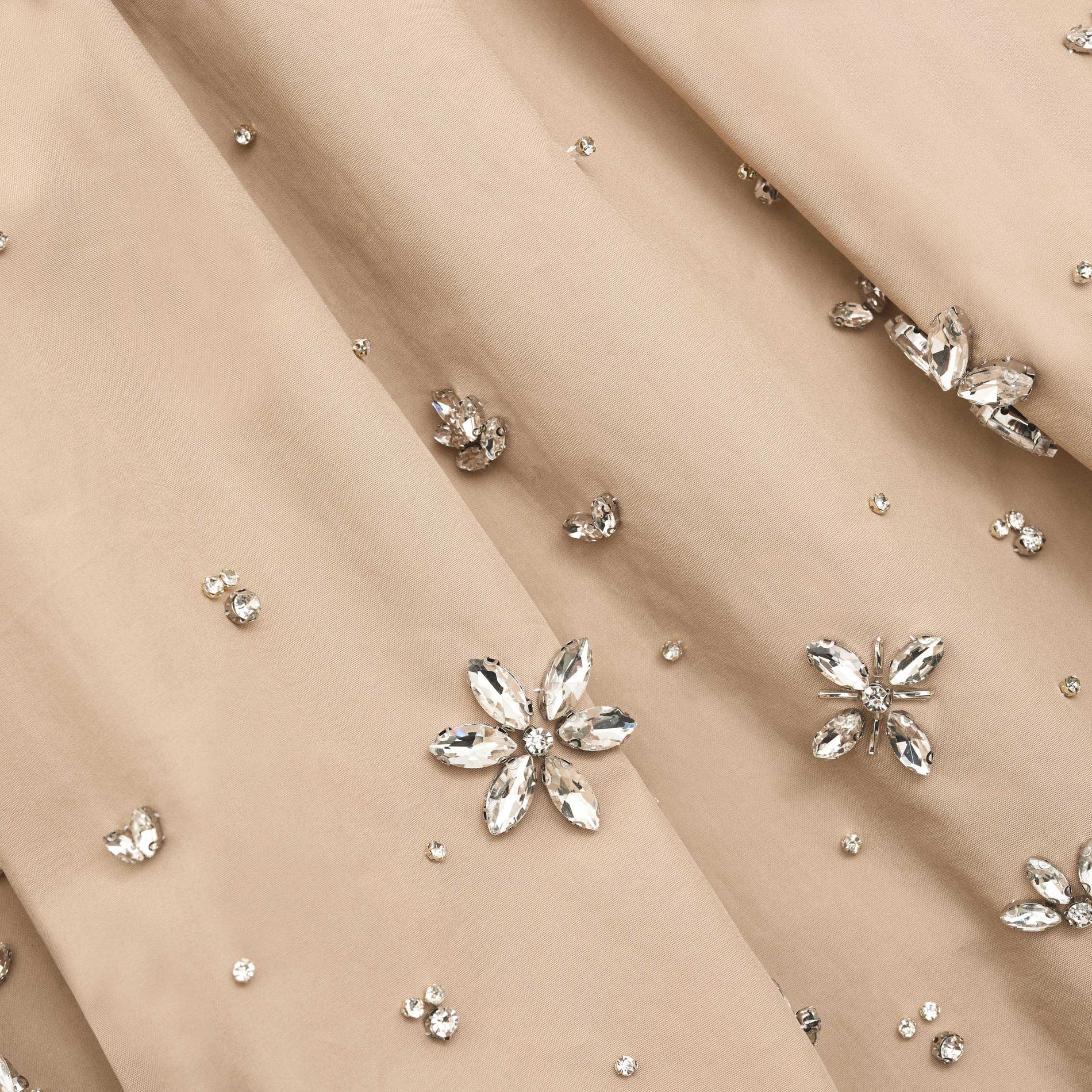 A close up of the fabric for the Beige Cotton Embellished Mini Skirt
