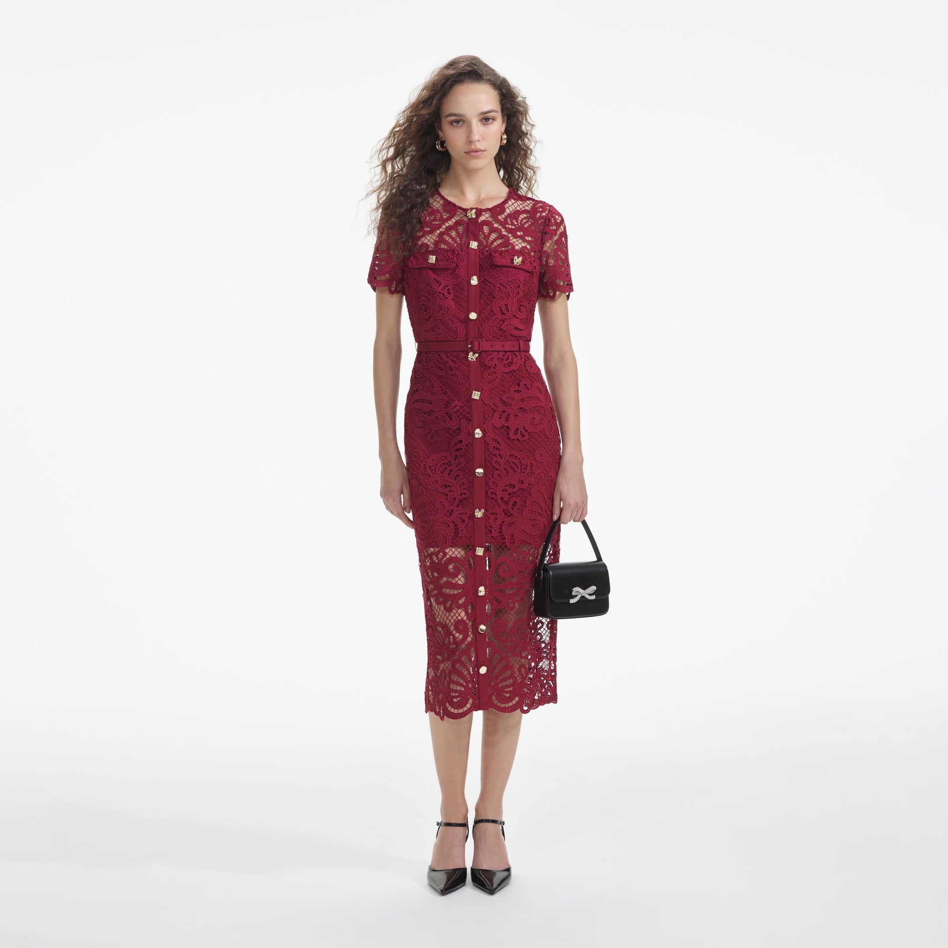 Side view of a woman wearing the Red Guipure Lace Button Midi Dress
