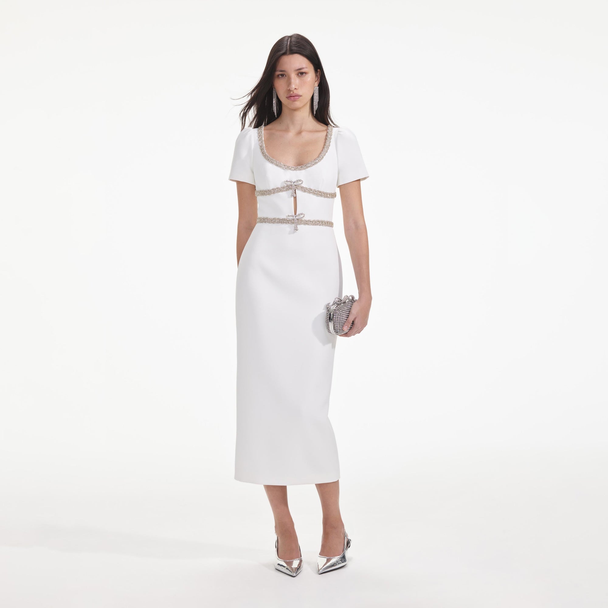 Front view of a woman wearing the White Diamante Bow Trim Midi Dress