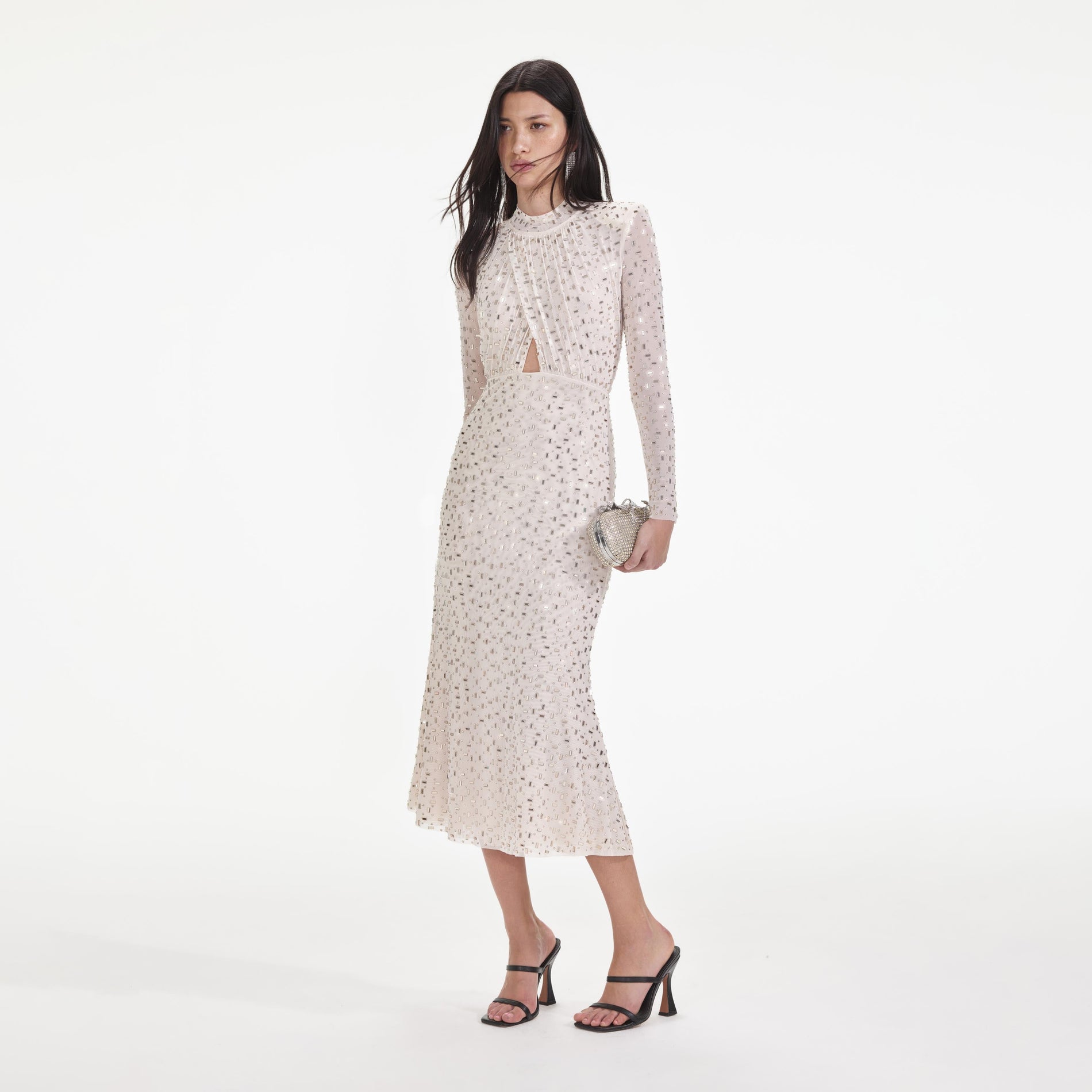 Side view of a woman wearing the Champagne Rhinestone Mesh Midi Dress