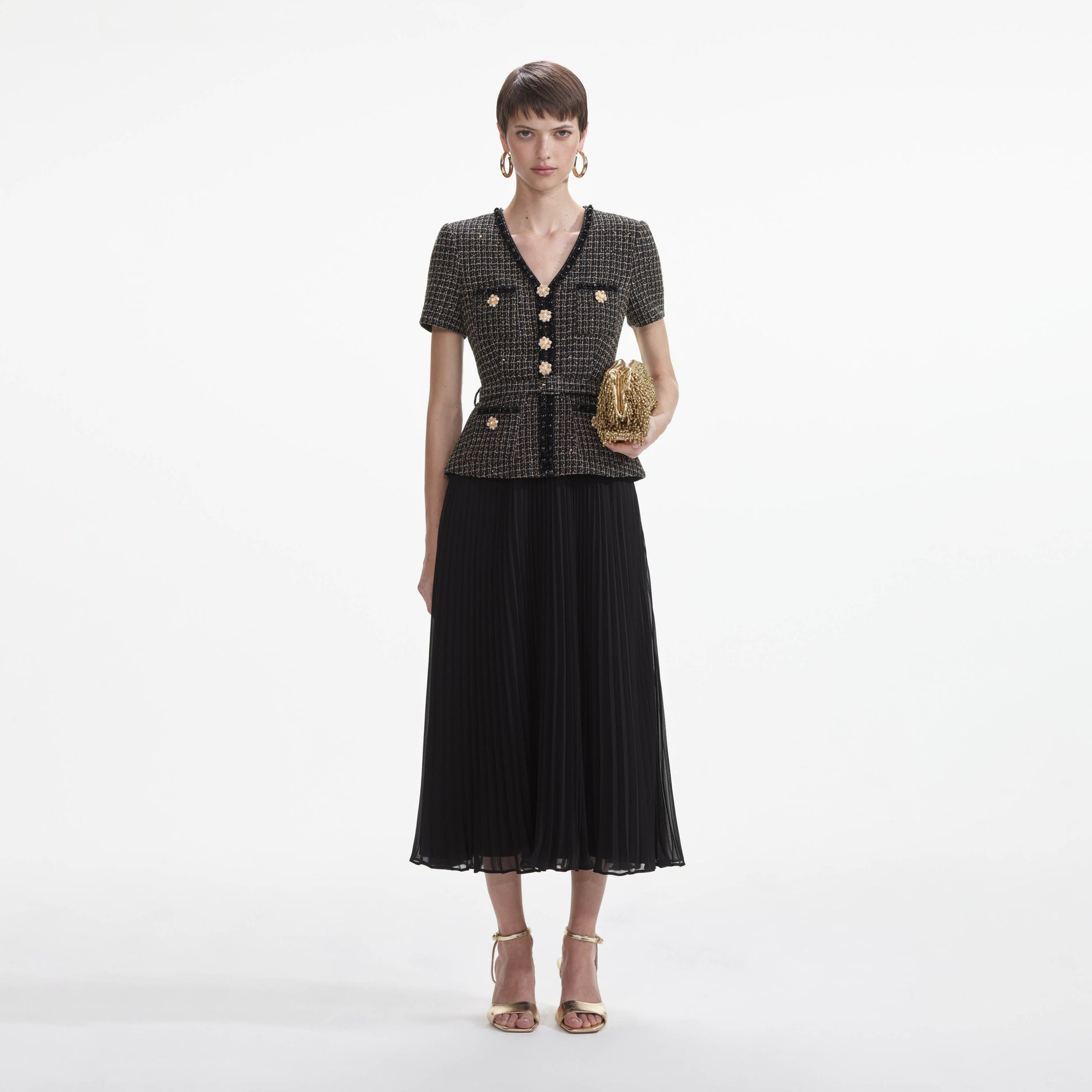 Front view of a woman wearing the Black Boucle Chiffon Midi Dress