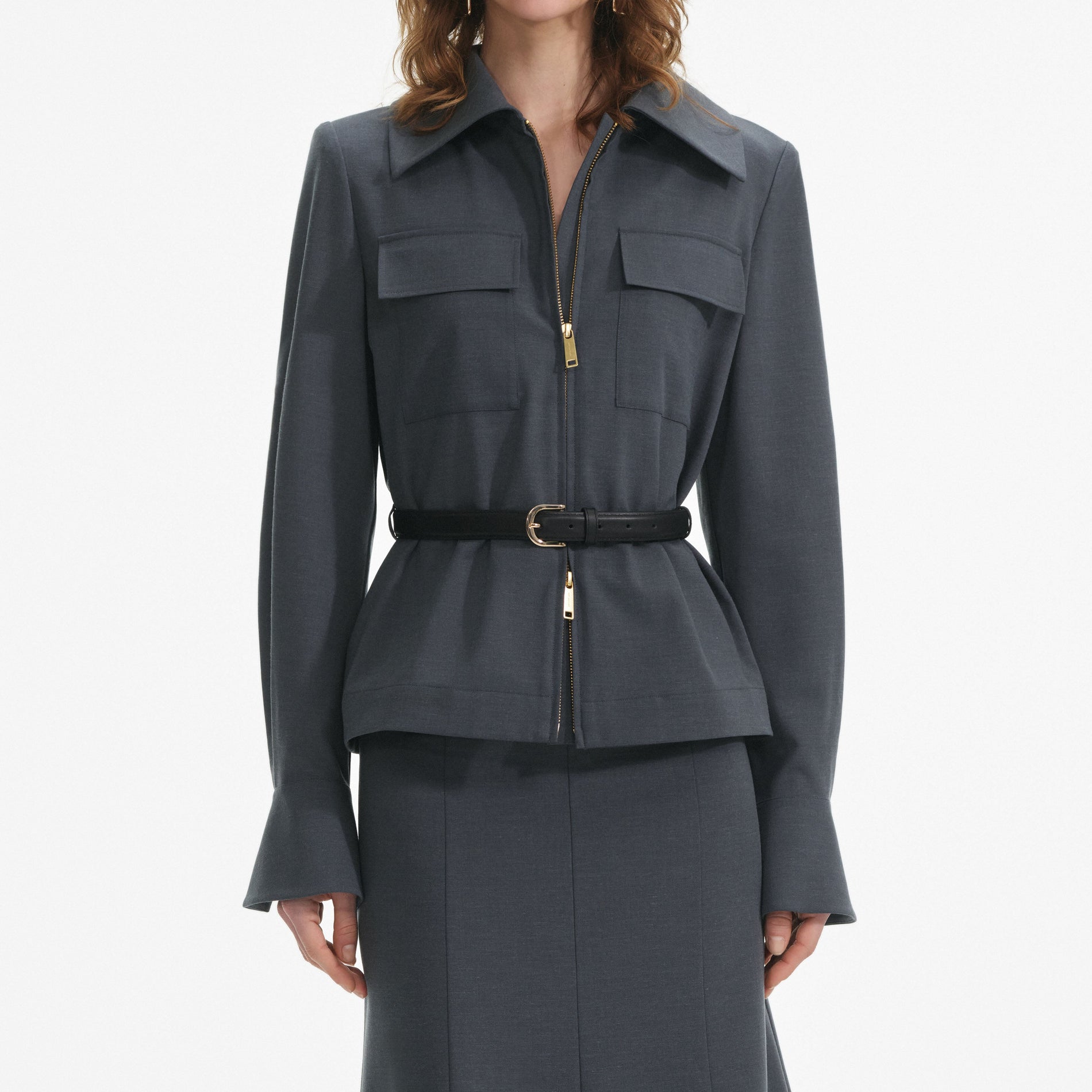 A close up of a woman wearing the Grey Twill Midi Dress