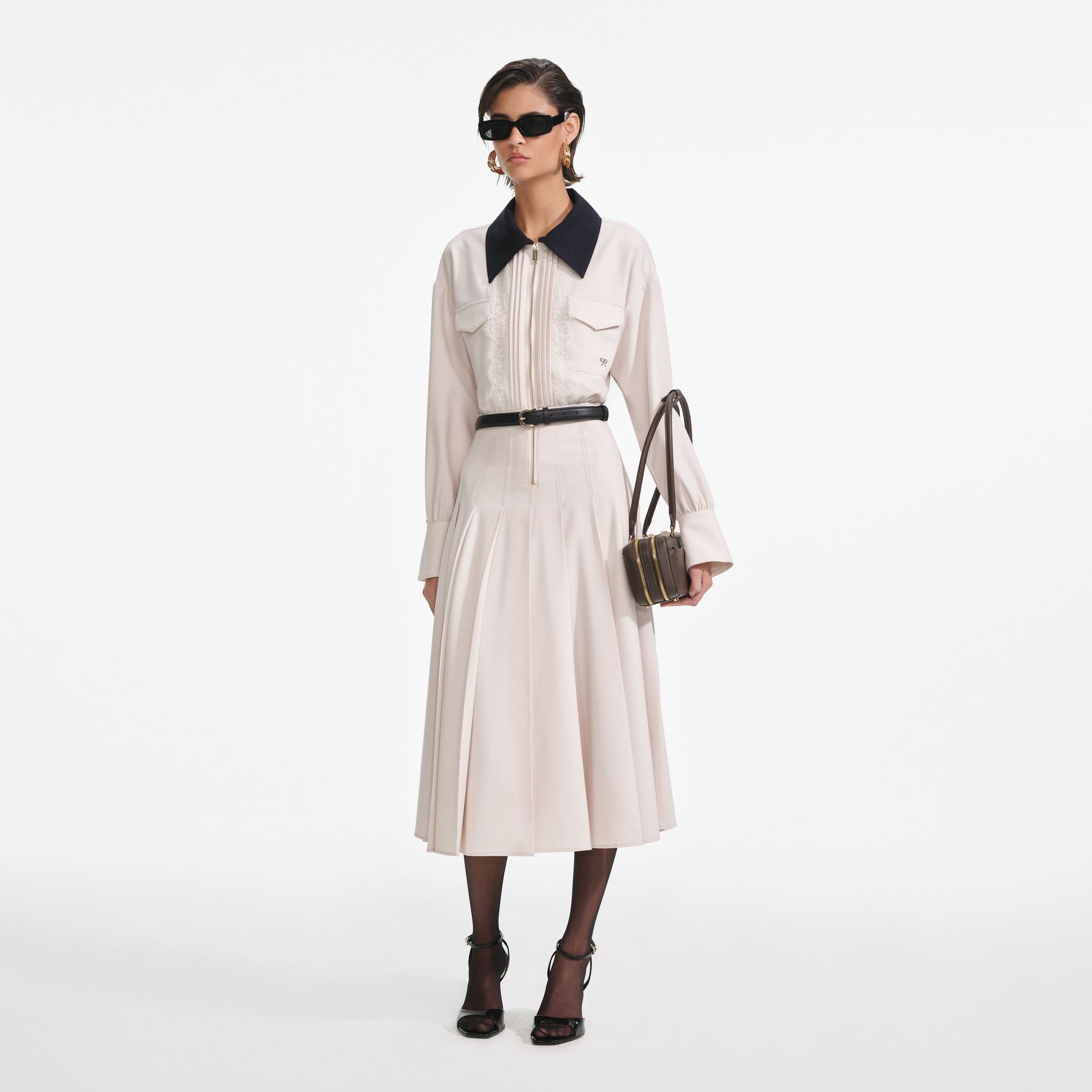 Side view of a woman wearing the Cream Twill Contrast Collar Midi Dress