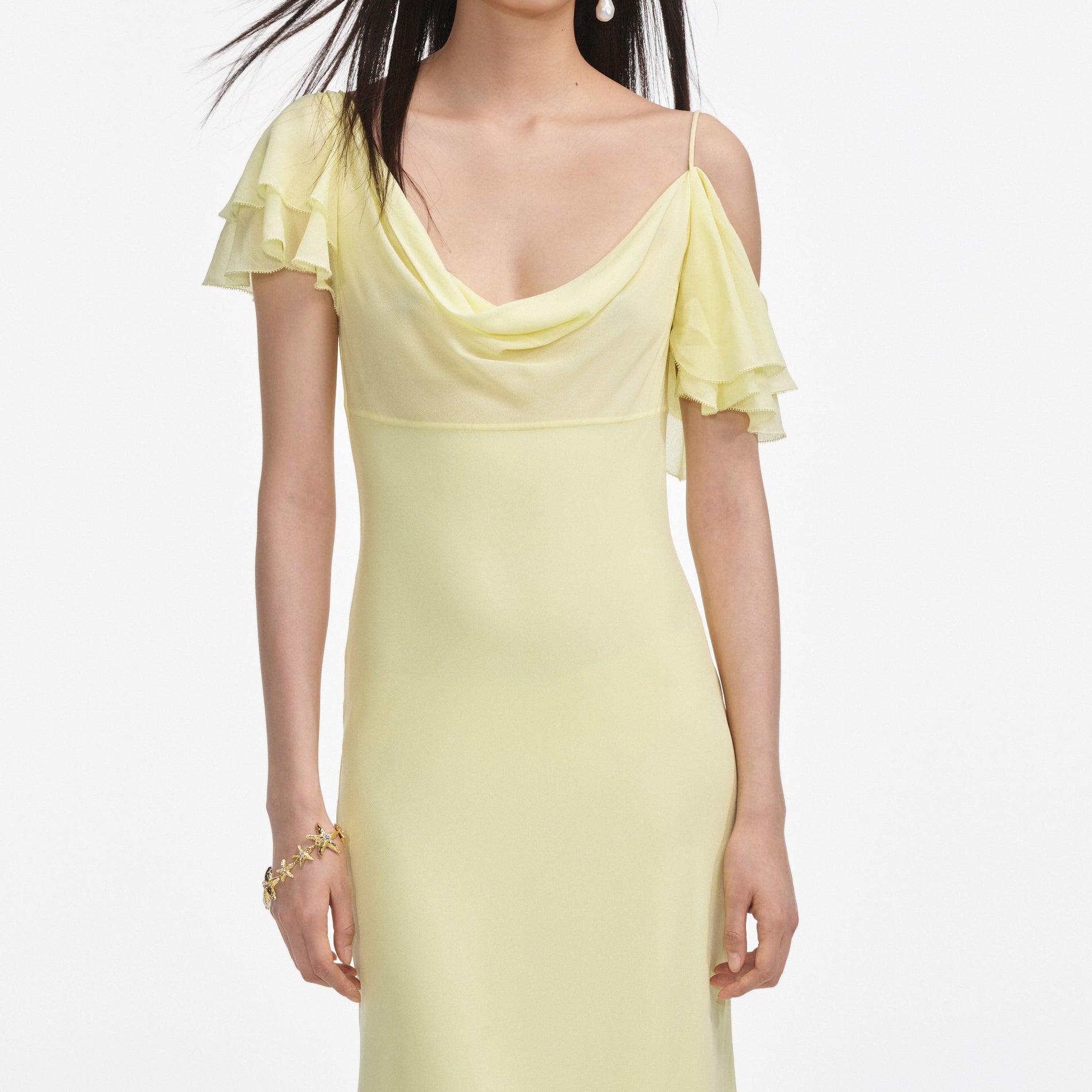 A close up of a woman wearing the Yellow Georgette Frill Midi Dress