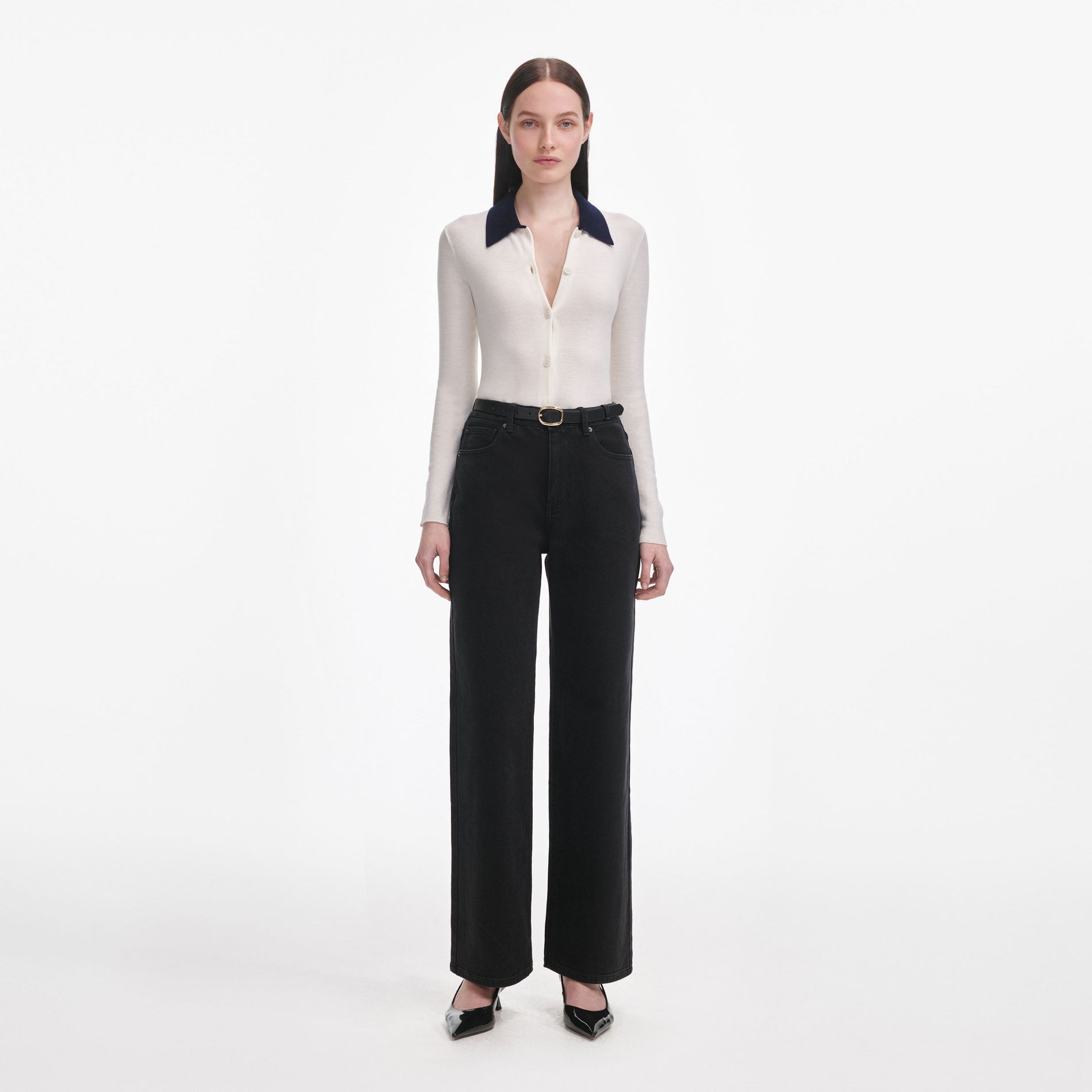 Front view of a woman wearing the Black Straight Leg Jeans