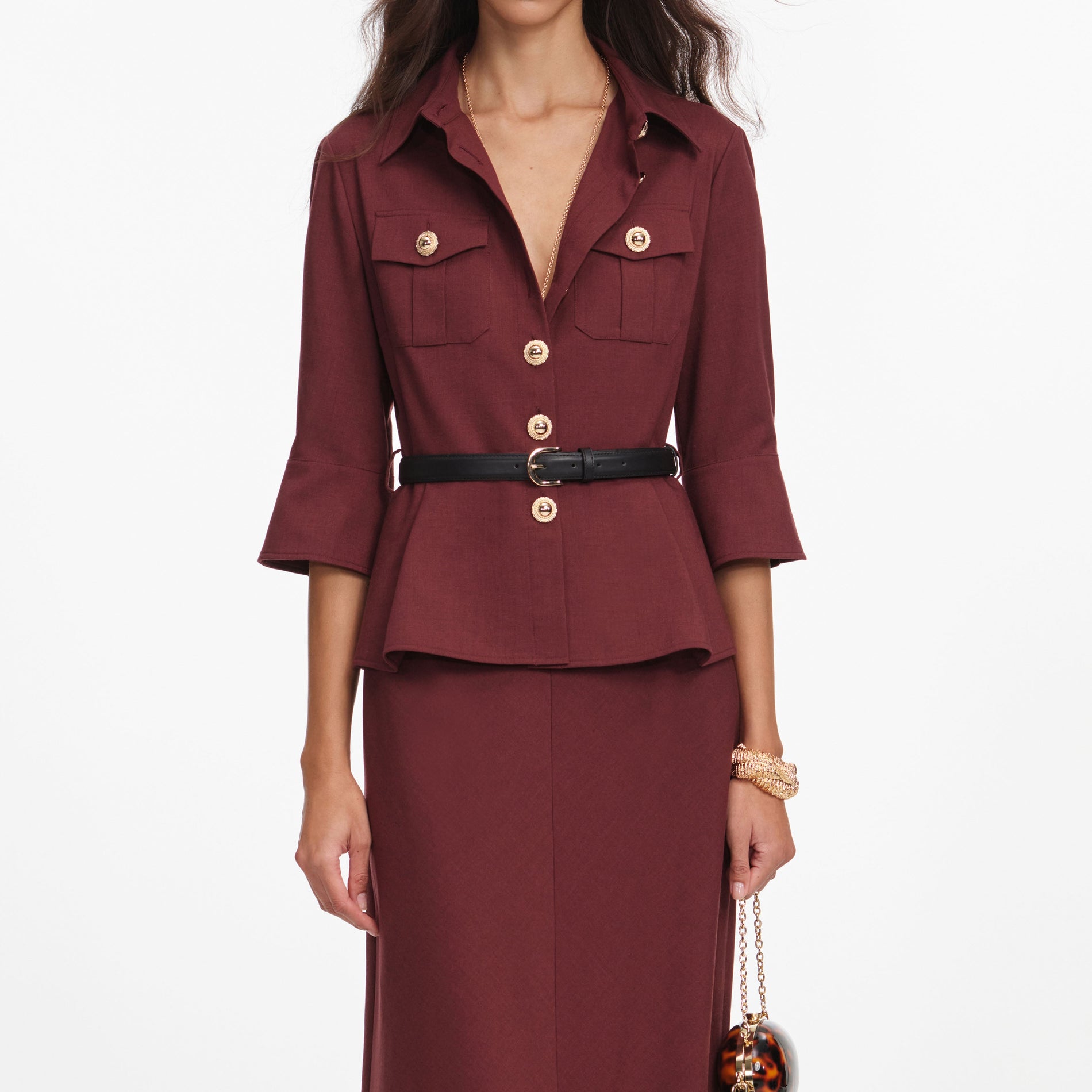 A close up of a woman wearing the Brown Twill Maxi Dress