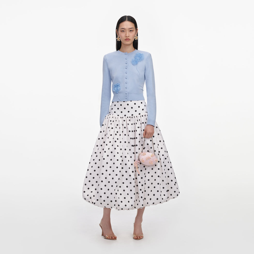 Front view of a woman wearing the Blue Flower Knit Cardigan