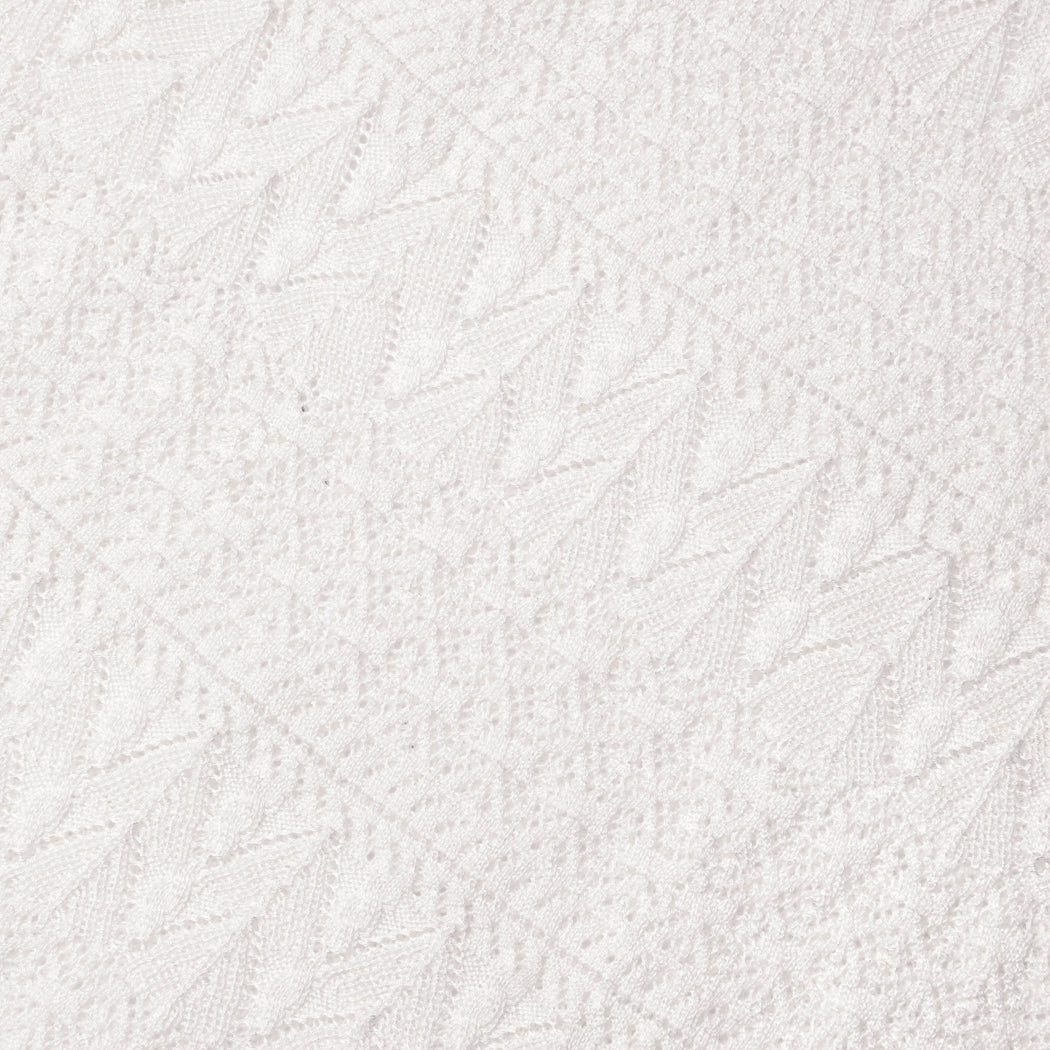 A close up of the fabric for the White Pointelle Knit Midi Skirt