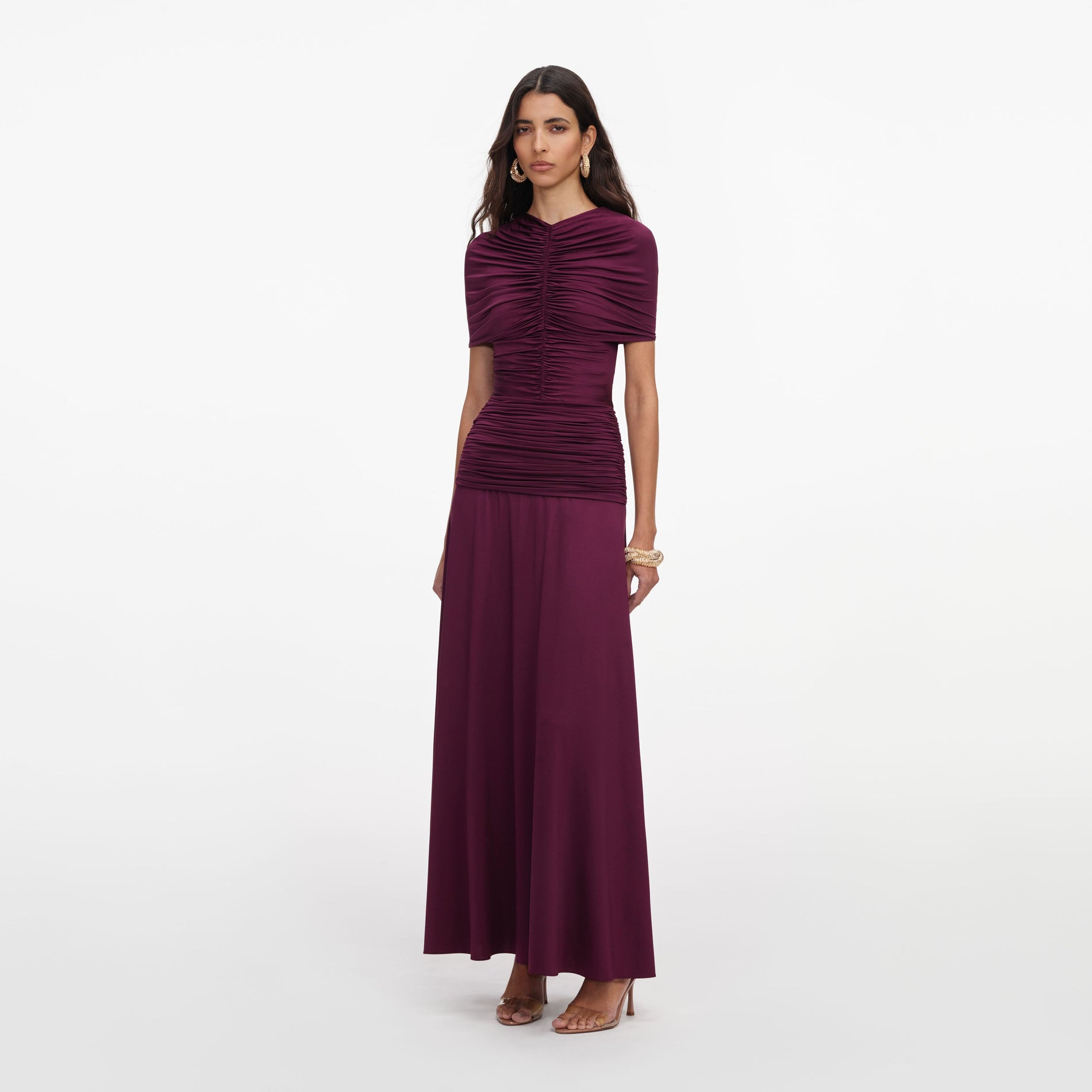 Side view of a woman wearing the Burgundy Jersey Gathered Midi Dress