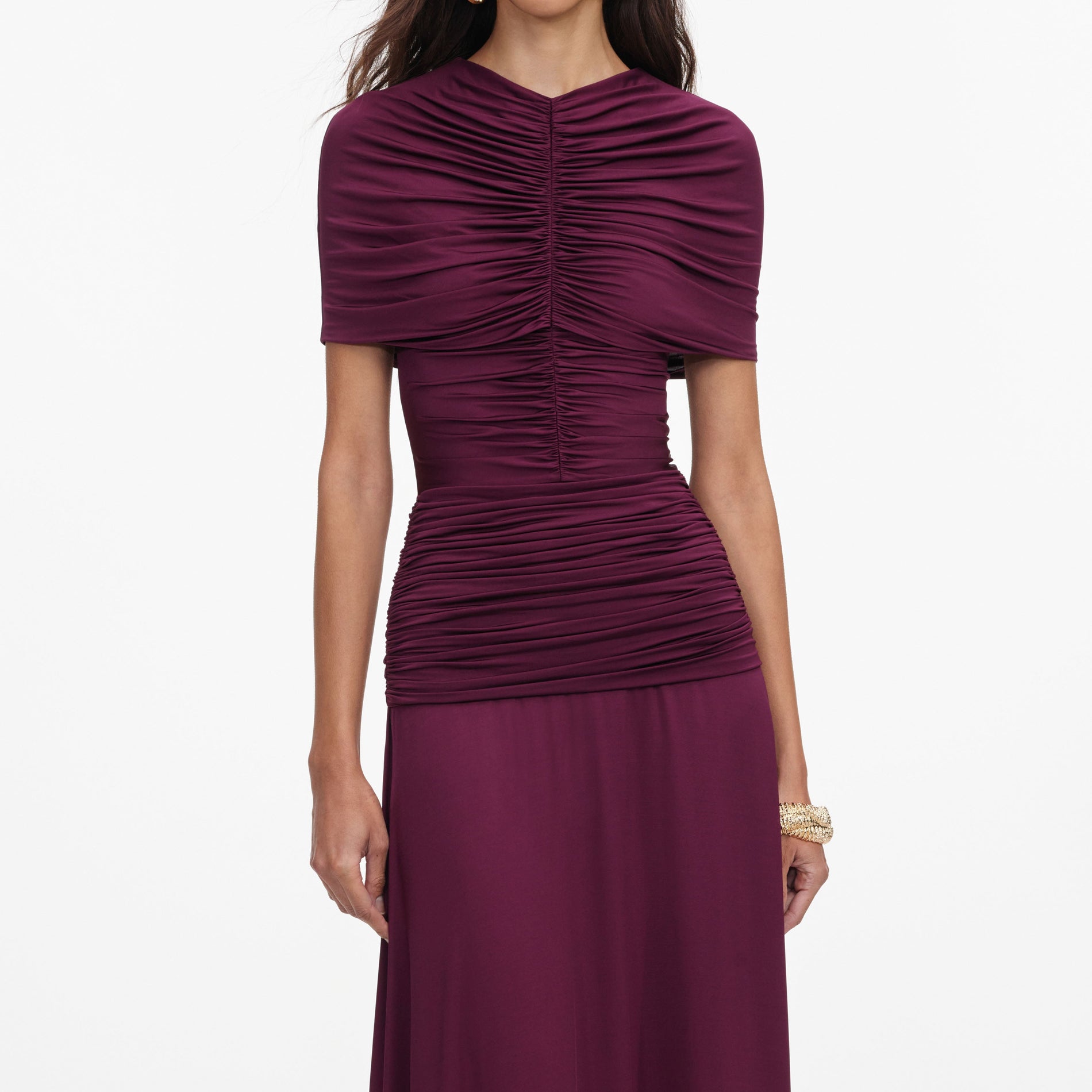 A close up of a woman wearing the Burgundy Jersey Gathered Midi Dress