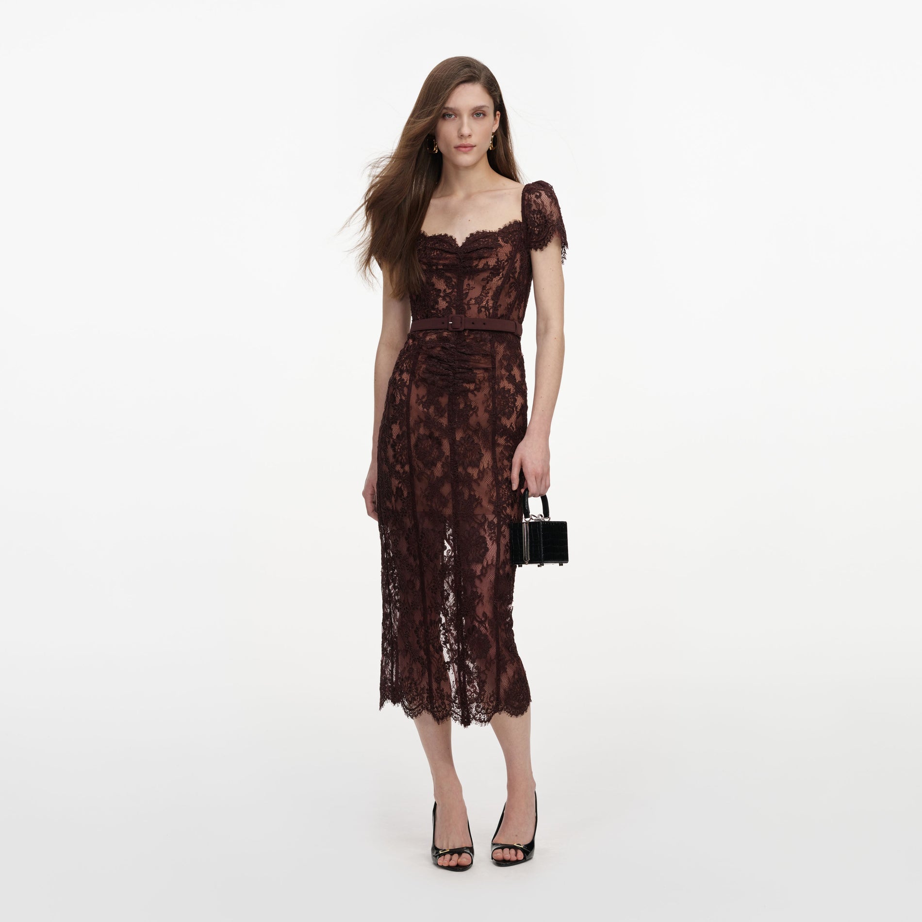 Front view of a woman wearing the Brown Floral Lace Midi Dress