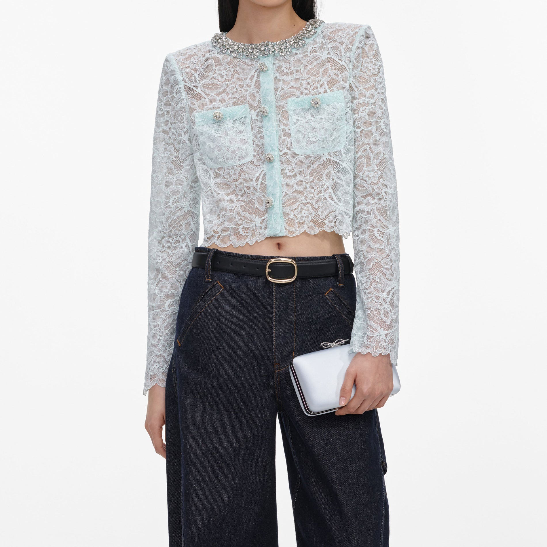 A close up of a woman wearing the Mint Lace Crystal Embellished Jacket