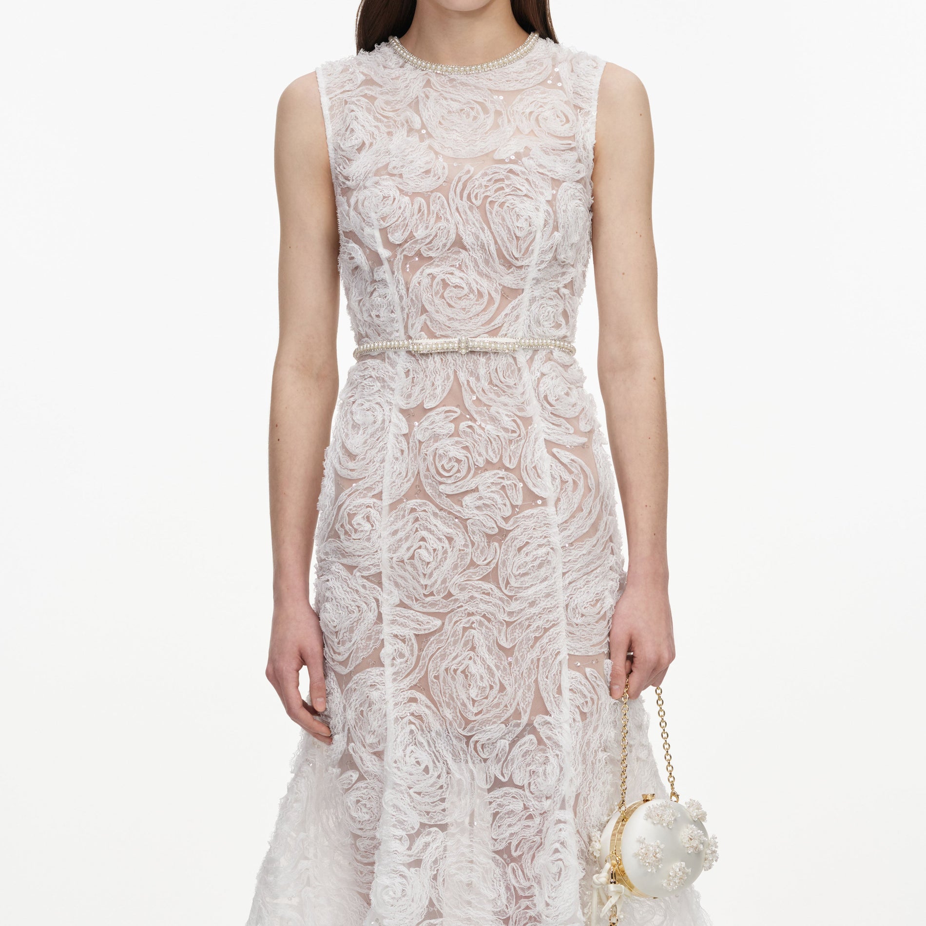 A close up of a woman wearing the White Tulle Lace Midi Dress