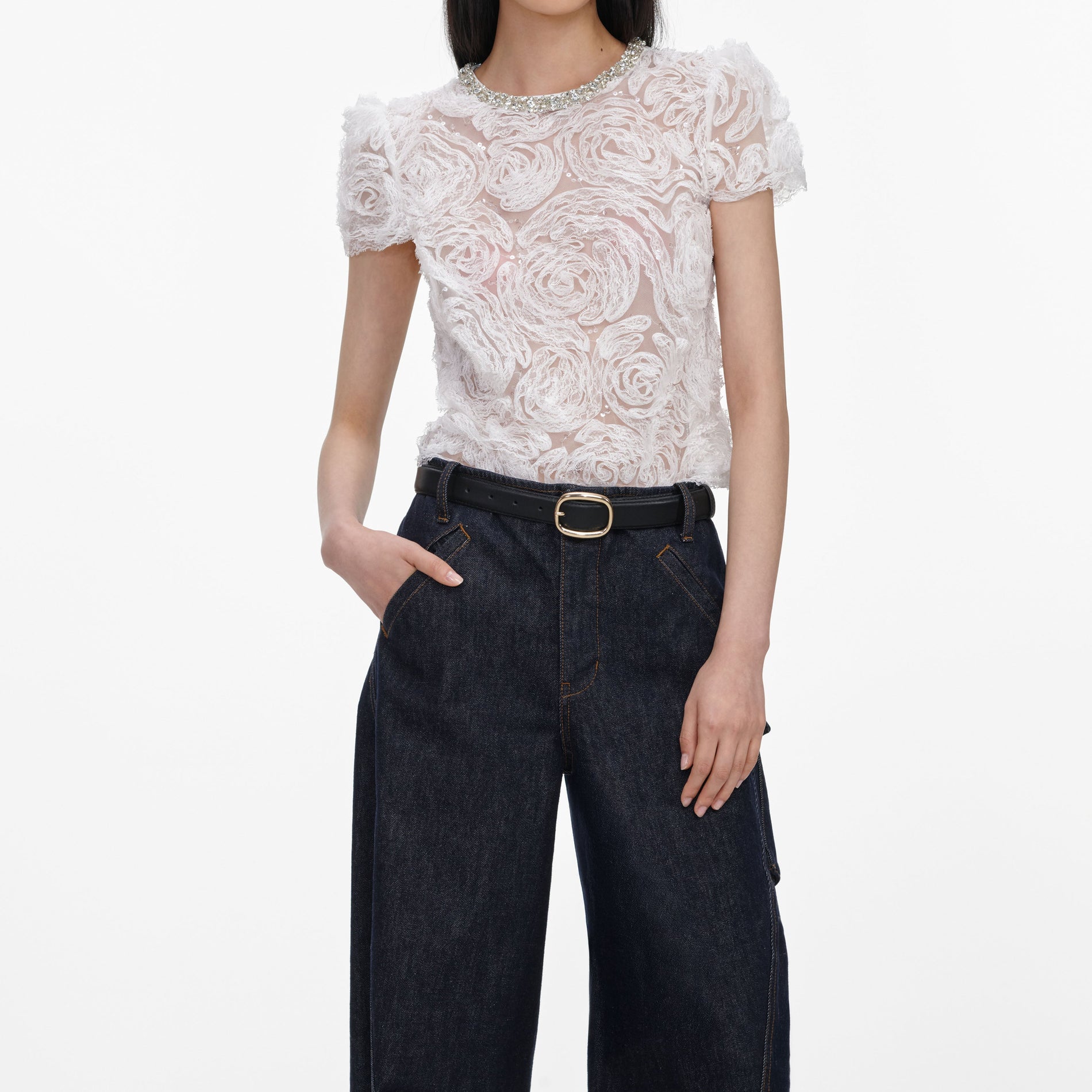 A close up of a woman wearing the White Tulle Lace Top