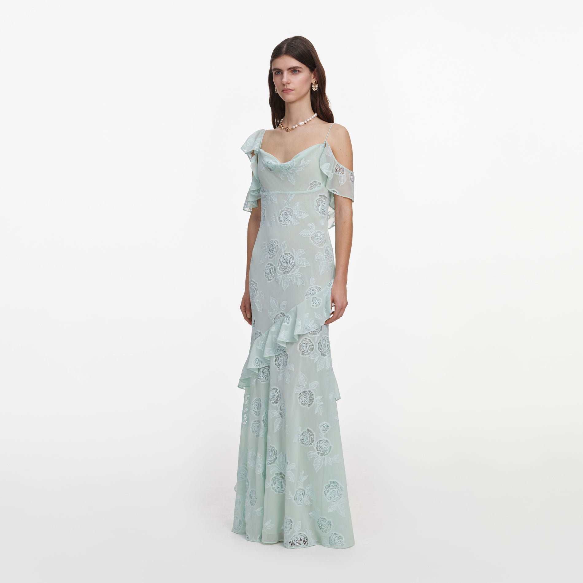 Side view of a woman wearing the Mint Embroidered Georgette Maxi Dress
