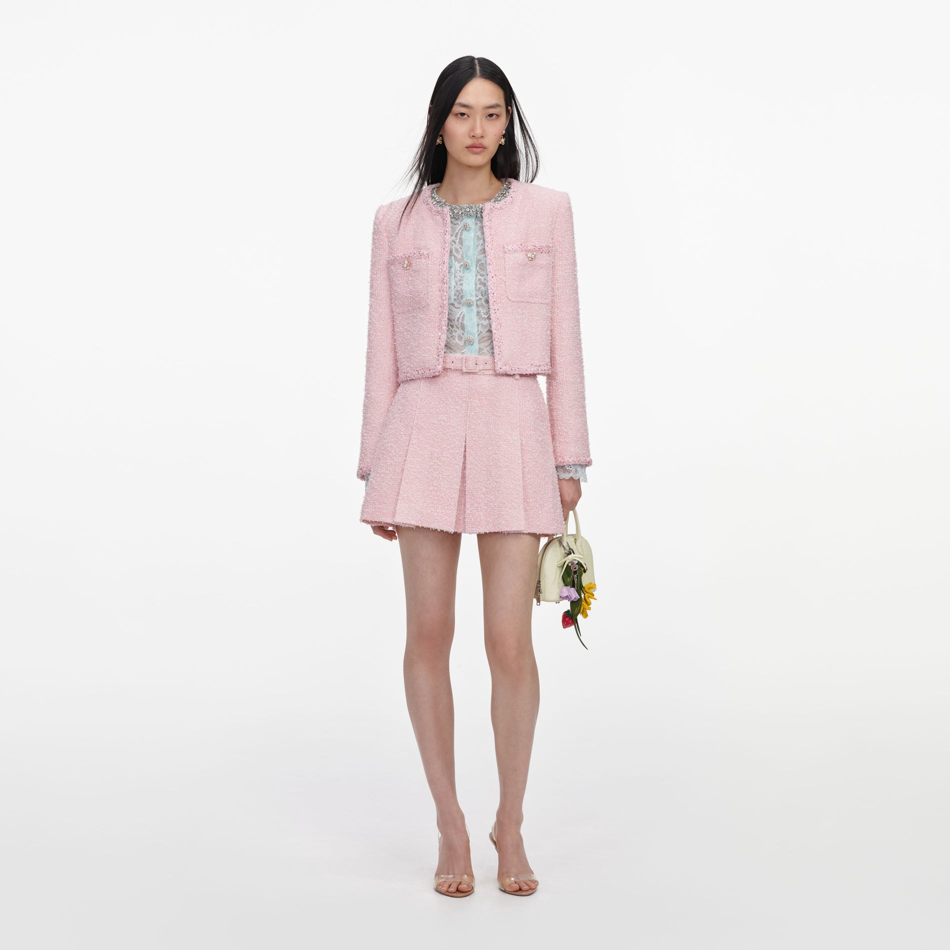 Front view of a woman wearing the Pink Boucle Jacket