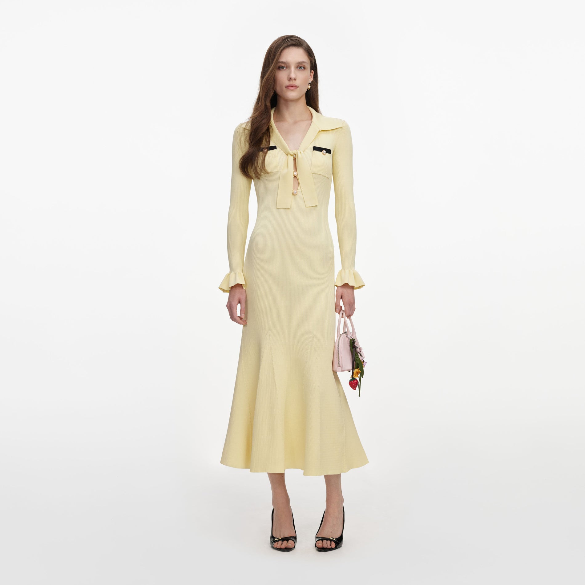 Front view of a woman wearing the Yellow Viscose Knit Tie Midi Dress