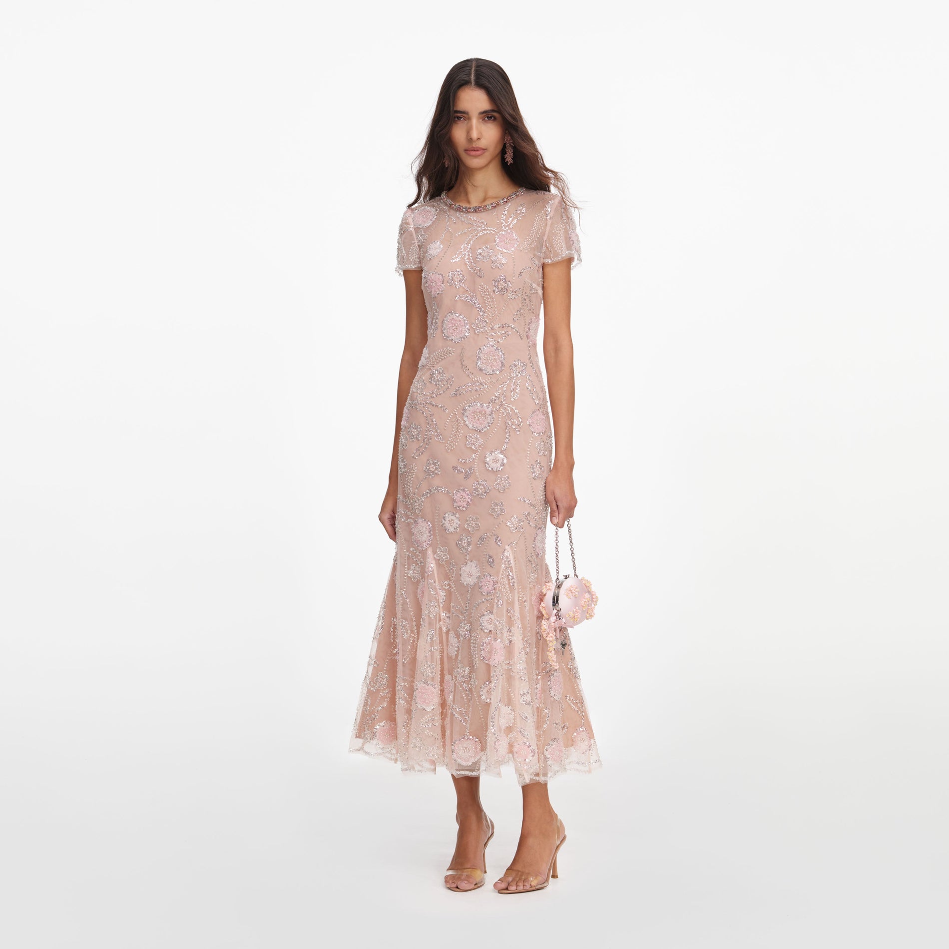 Side view of a woman wearing the Pink Flower Sequin Embellished Midi Dress