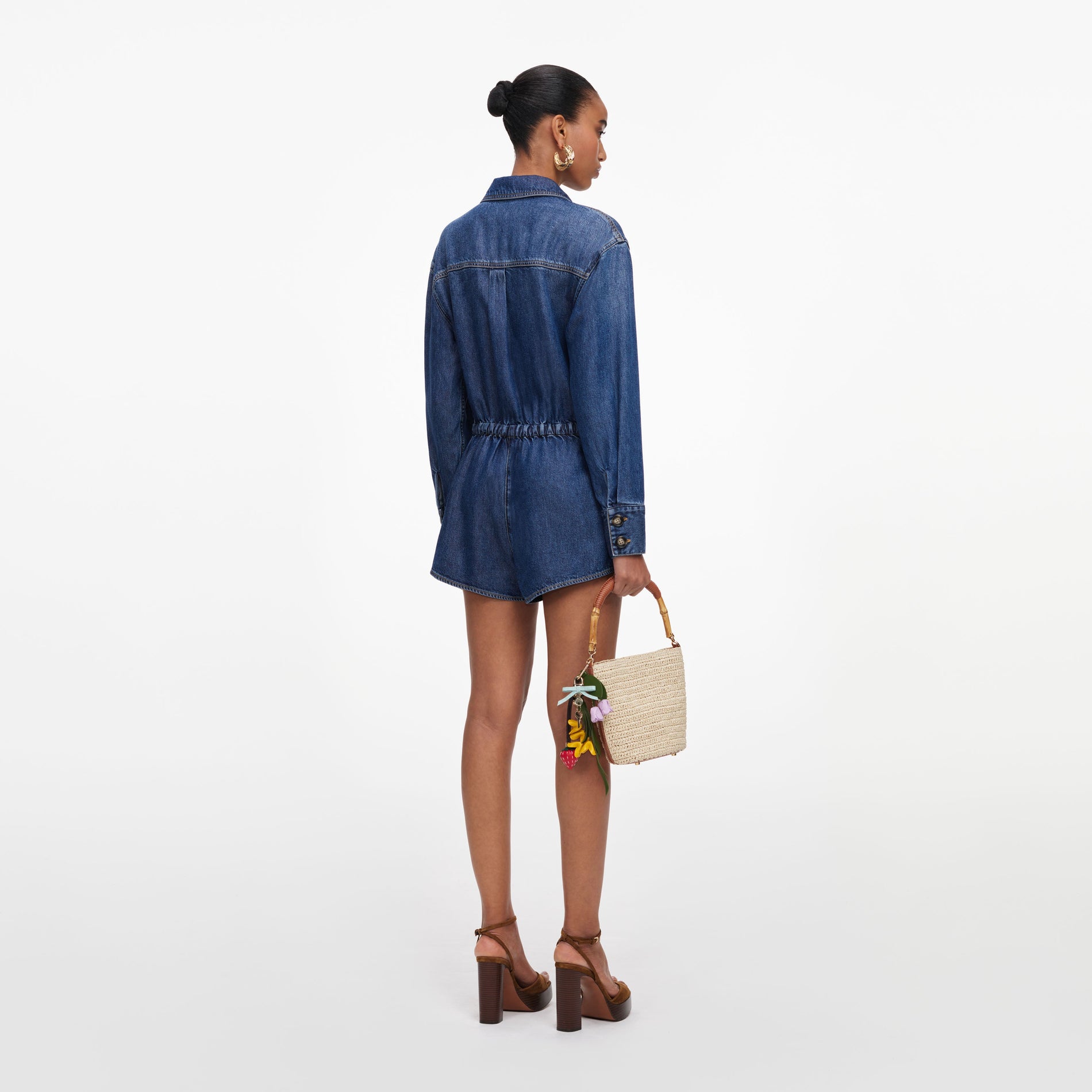 Back view of a woman wearing the Denim Relaxed Fit Playsuit